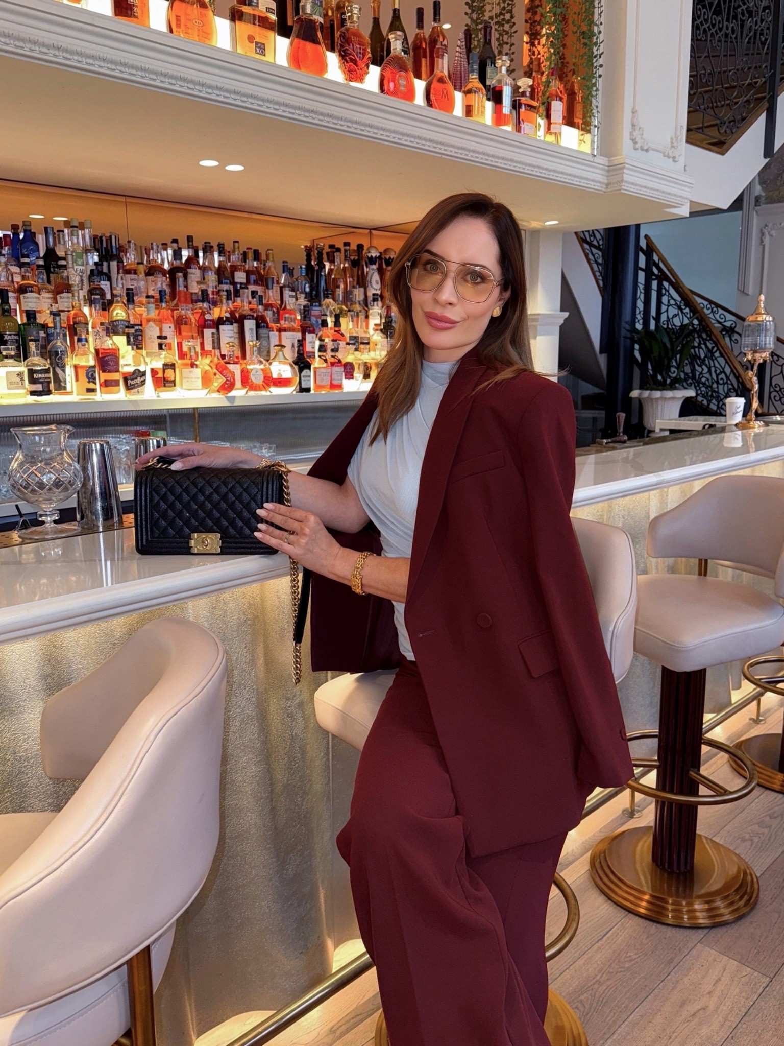 Beautiful combination of burgundy suit and baby blue top with Shield sunglasses for Christmas lunch in London #burgundy #drapetop

#LTKootd #LTKselfcare #LTKSeasonal