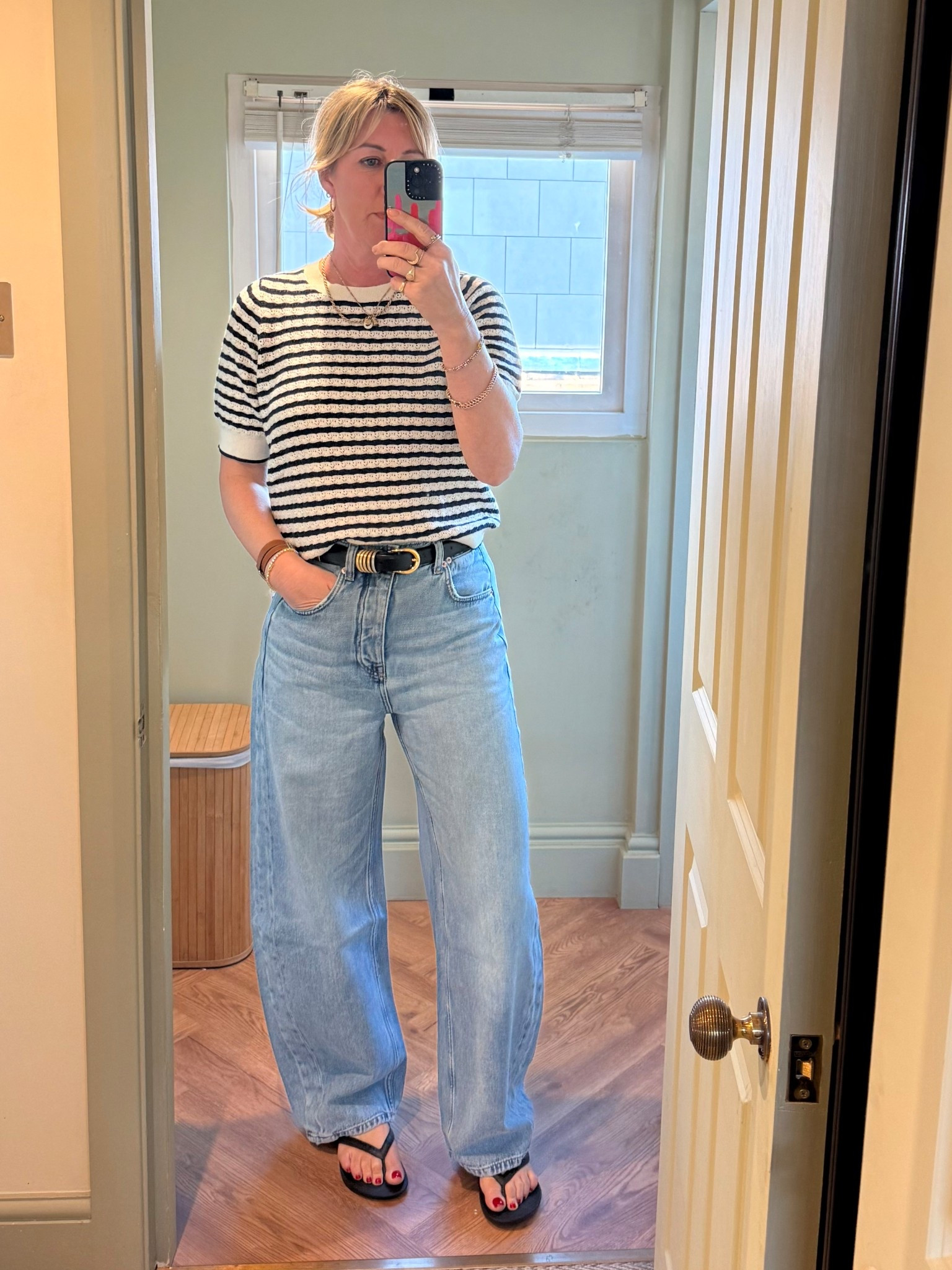 White Stiff top, Free People jeans, Archie’s flip flops

#LTKuk #LTKspring #LTKover50style