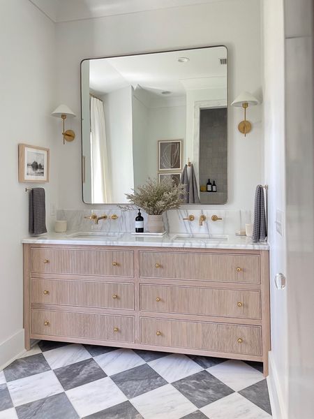 Bathroom remodel, cottage bathroom, primary bathroom, bathroom mirror, bathroom sconces, gold sconces, brass sconces, bathroom lighting, bathroom hardware, cabinet hardware, bathroom art, marble tray, brass faucet, wall mounted faucet, marble floors, bathroom flooring, brass hardware 

#LTKstyletip #LTKhome #LTKfindsunder50