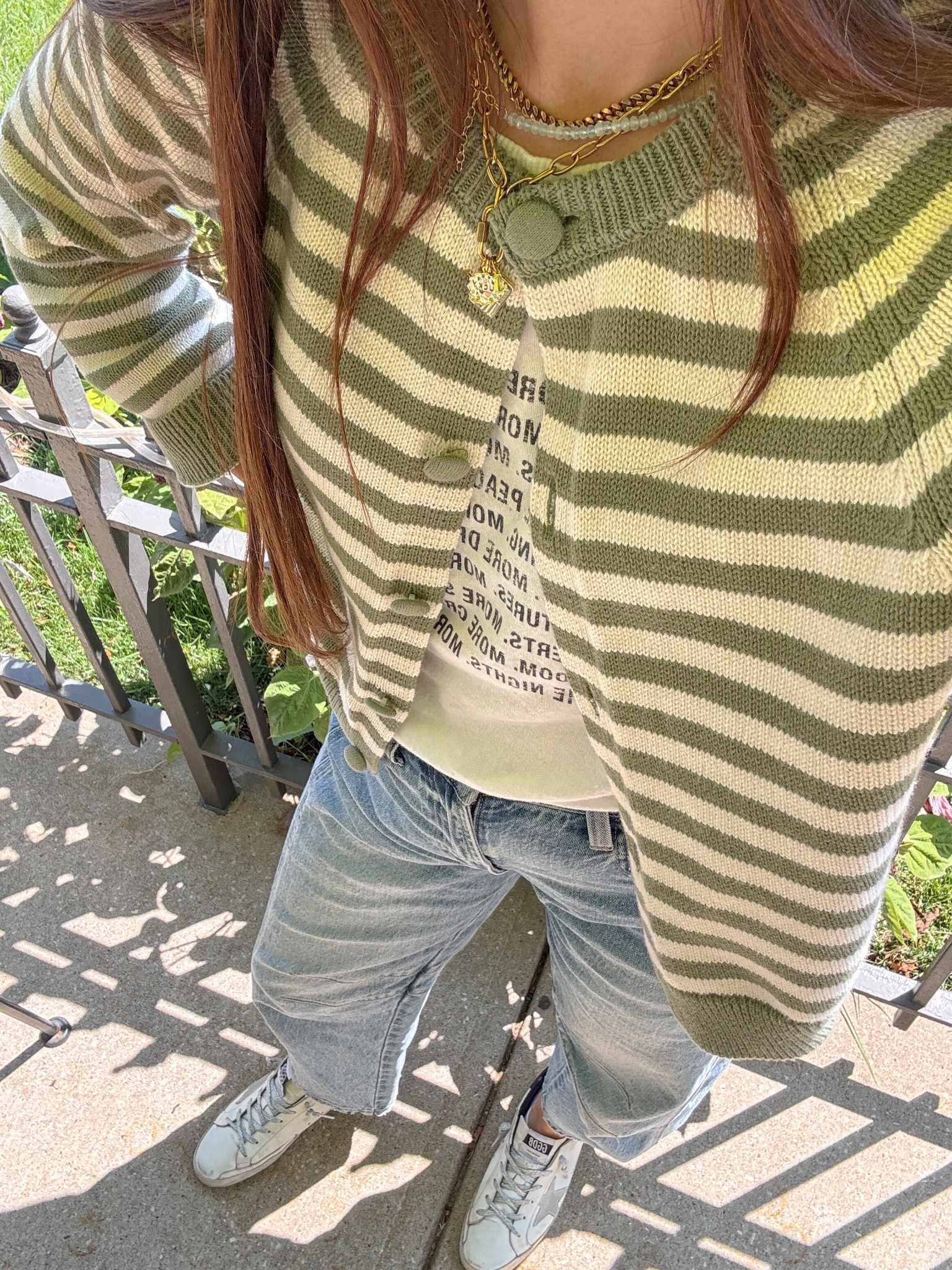 Another target cardigan to run for! This color way is sure to sell out and it’s at a great price point ($32)! I own it in brown as well and the fabric is great!! Wearing size small for reference.

Fall fashion 2025, cardigan weather, fall sweaters, green striped cardigan, target fashion 

#LTKFindsUnder50 #LTKStyleTip