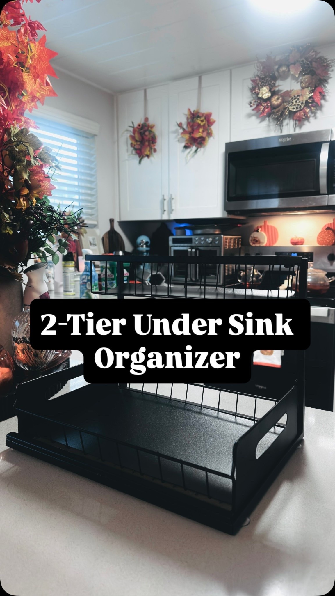 Comment ORGANIZE if you’d like the link to shop! 

My under sink chaos just met its match. This 2 tier sliding organizer turned my cluttered cabinet into a boutique style storage moment in under 10 minutes.

POV: No more digging, bending, and knocking over bottles under the sink.
I assembled this 2 tier under sink organizer and I am obsessed. The bottom drawer slides out, the top basket keeps everyday essentials in reach, and those black liners make everything look custom.

From chaos to calm:
Cleared everything out
Popped the frame together, no tools needed

Added the wire baskets + liners

Slid it right under the sink around the pipes

Restocked by category: sprays, dish soap, dishwasher pods, sponges
Small kitchen, big luxury energy.
Save this for your next kitchen reset. Would you try this under your sink?

under sink organizer, under sink storage, kitchen sink organizer, 2 tier under sink organizer, under kitchen sink storage ideas, small kitchen organization, pull out cabinet organizer