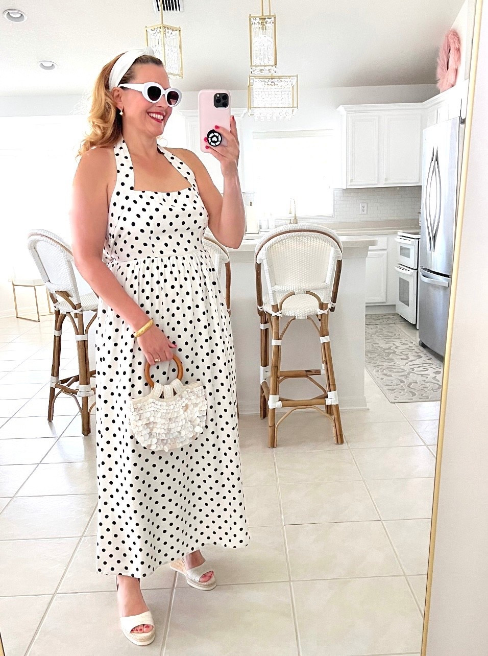🫶🏻POLKA DOT DRESS: #ad Bringing some retro vibes with this outfit! #petalandpup @petalandpup

🫶🏻Loving this halterneck maxi dress. It beautifully highlights your shoulders. The length of the dress is perfect and it creates a chic silhouette as you move. 

🫶🏻It has functional side pockets, an inside lining and zips up the back. I’m wearing a large. There is NO STRETCH on the back panels. This is a tight fit for me. I’m a 36B chest. Fabric feels fantastic!

#LTKSeasonal #LTKOver40 #LTKSaleAlert #LTKWedding #LTKTravel #LTKgrwm #LTKootd #LTKMidsize #LTKSwim #LTKFestival #LTKMothersDay