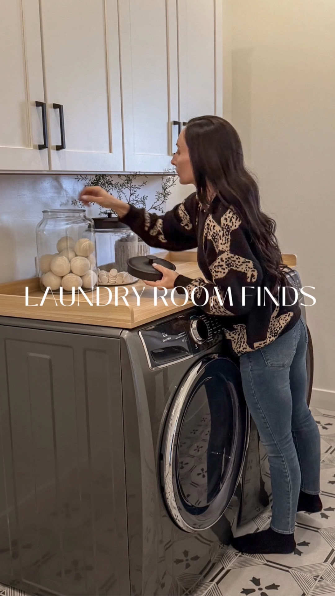 Our laundry room is still a work in progress and yes, we’re planning a full redesign later this year. In the meantime, this setup has been working great. Switching to front loaders meant rethinking everything, so we added a countertop that gives us actual space to fold, sort and stay organized 

The collapsible laundry baskets are perfect for saving space when they’re not in use and I’ll forever swear by dryer balls… they work and they look beautiful stored in containers I already use throughout our home.

Laundry room organization, unfinished laundry room ideas, laundry room redesign plans, front load washer dryer setup, laundry room countertop for washer and dryer, laundry folding station, space saving laundry baskets, collapsible laundry baskets Amazon, dryer balls for laundry, wool dryer balls benefits, laundry room storage containers, functional laundry room ideas, small laundry room organization, modern laundry room storage, Amazon laundry room finds, laundry room essentials, aesthetic home organization

#LTKmomlife #LTKHome #LTKSeasonal