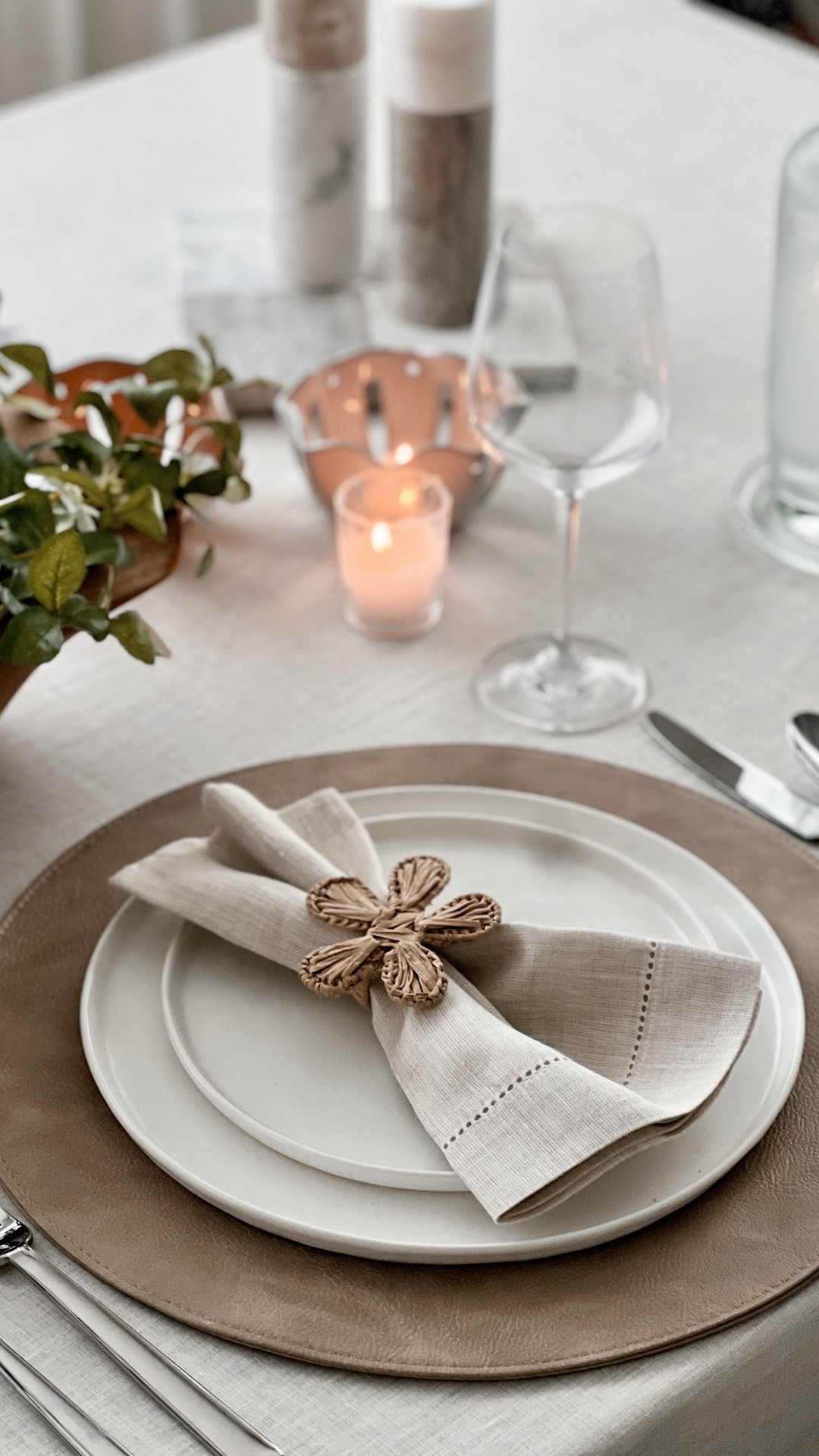 Timeless neutral table decor never goes out of style. This tablescape features a neutral linen tablecloth, linen napkins, white dinnerware, woven chargers, layered place settings, stoneware plates, neutral napkin rings, candle centerpiece, wood dough bowl, flameless candles, clear stemware, brass salt and pepper mills, amber glass, modern organic decor, cozy fall table inspiration, summer tablescape, transitional decor, dinner party ideas, entertaining essentials, hostess favorites, and classic table setting ideas that work from summer through the holidays.

#LTKSeasonal #LTKHome