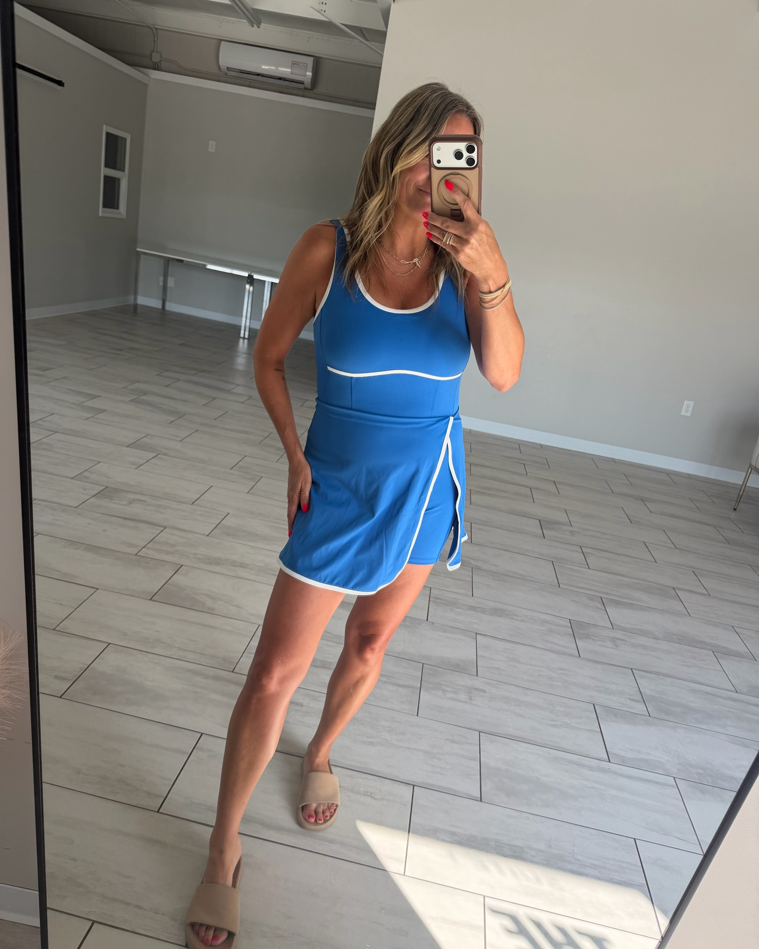 The absolute cutest look for less — comes in a ton of colors, built-in bra with removable pads, love the scoop neckline and love the slit on the side. Built in shorts and a cutie little cut out in back. I’m wearing TTS Medium

#LTKootd #LTKmomlife #LTKActive