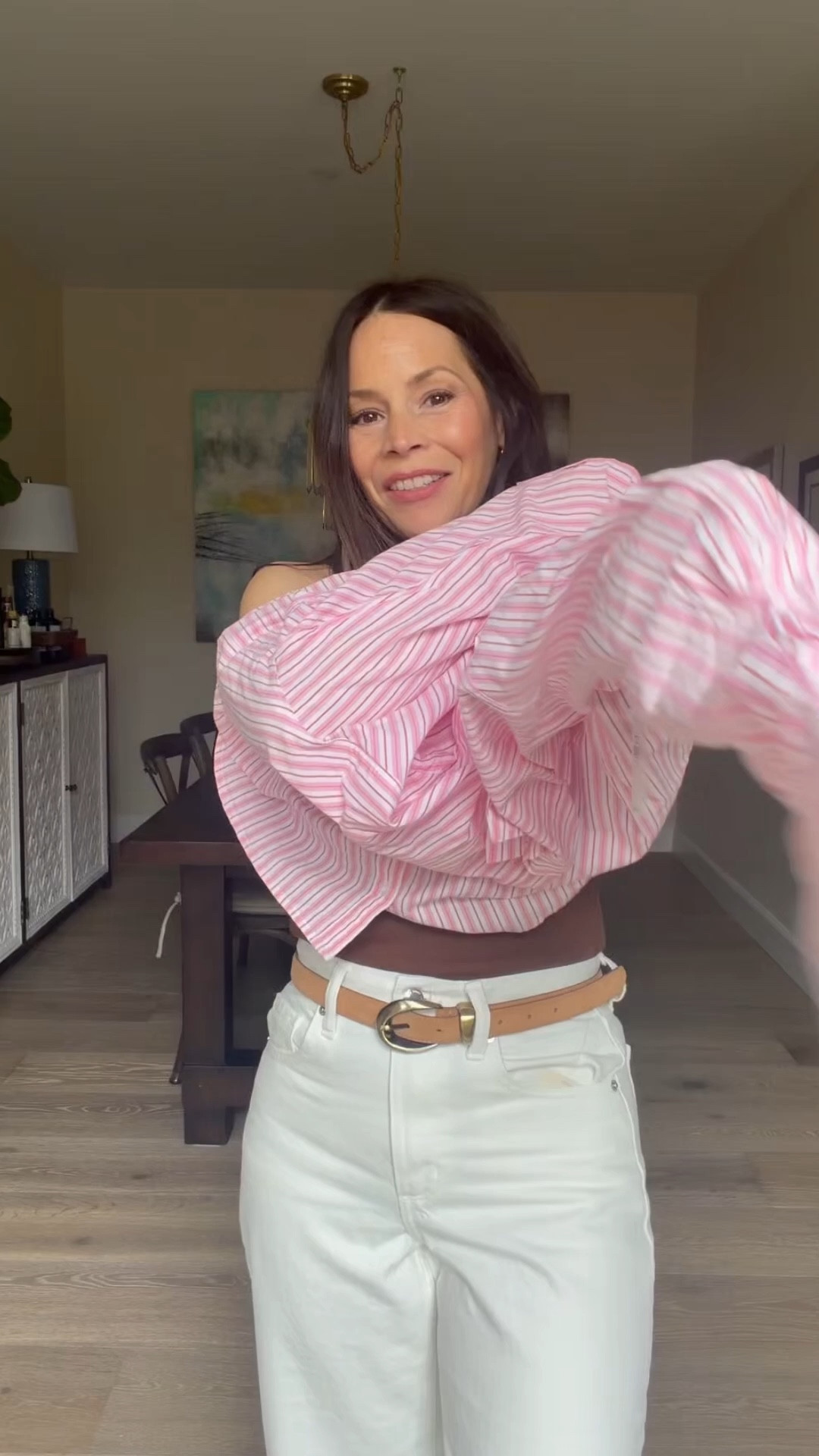 What I'm wearing on a spring day. New barrel leg jeans in ivory/exru, a boyfriend shirt that was clearly made for me. Do you like it tucked in all the way or the little half tuck?

#LTKOver40 #LTKootd #LTKPetite
