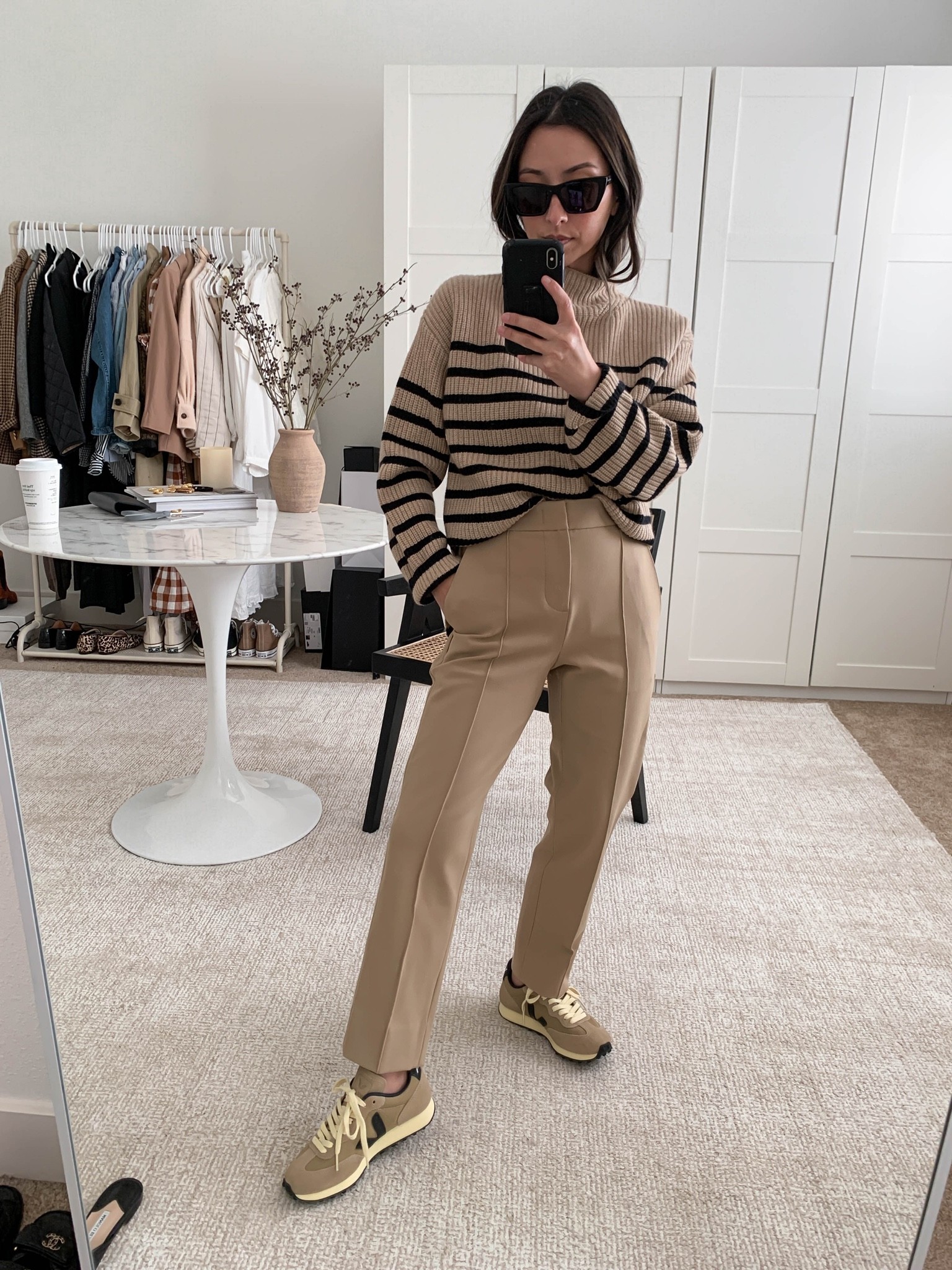 Vince trousers. Petite-friendly length and amazing quality. This sweater is such a great color for fall. I’m wearing the xxs and it fits extremely well. Not itchy either. 

Sweater - Rails xxs
Trousers - Vince 00
Sneakers - Veja 35. Run TTS 
Sunglasses - YSL 