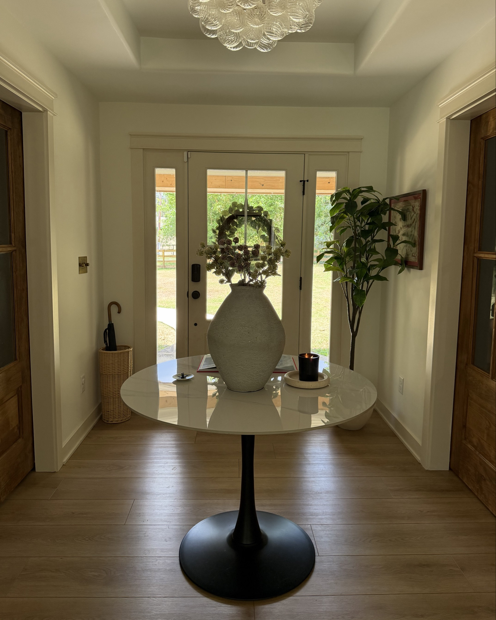 Entry table makeover 🤍✨
I turned my old round kitchen table into the centerpiece of this room and I’m obsessed with how it came out

Instead of getting rid of it, I repurposed it into an entry table, styled with a planter, incense, a book, and a few decor pieces to make it feel intentional and welcoming the second you walk in. It fills the space perfectly and makes the whole room feel more finished

proof you don’t always need to buy something new… sometimes it’s just about seeing what you already have differently ♻️🏡

#LTKHome