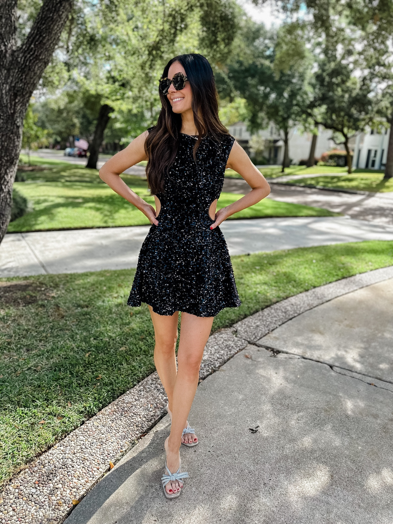Black sequin dress with side cutouts, size small. #confetepartner @shop.confete