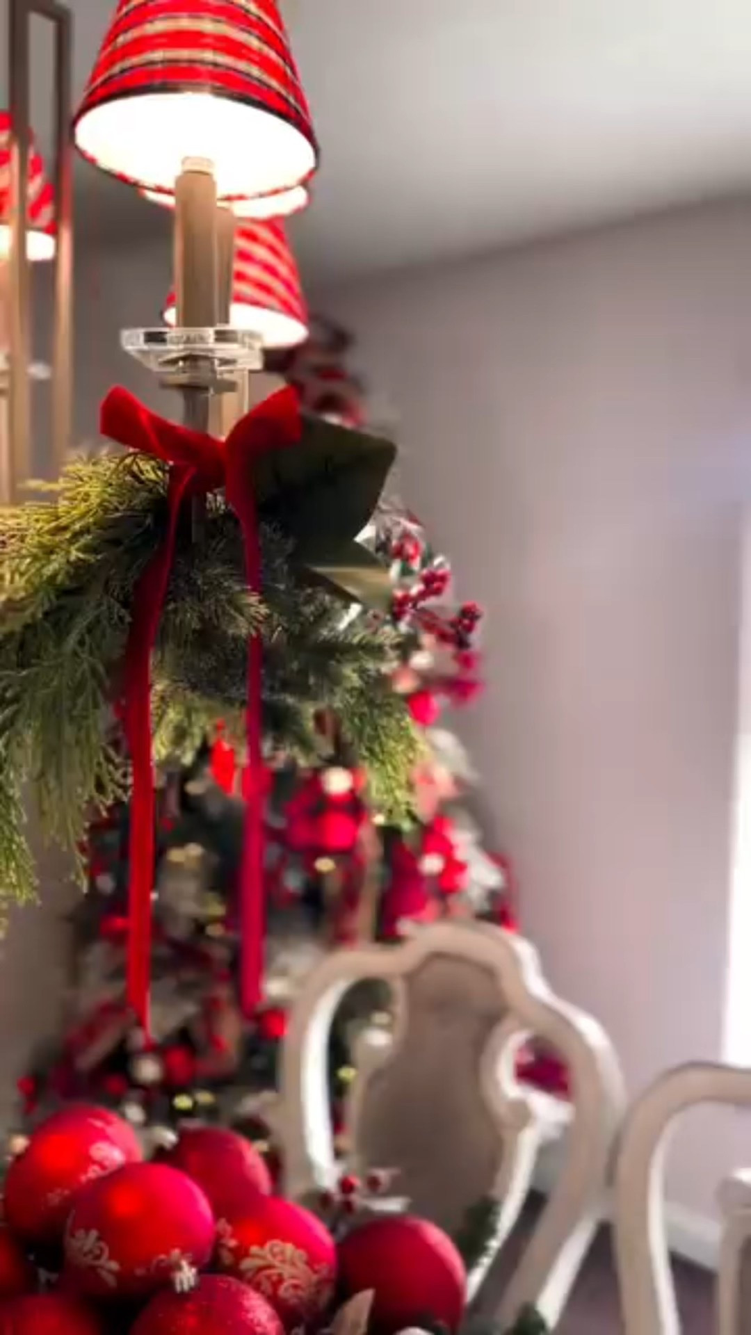 This Christmas, my heart feels so full. We happen to be one of the few families who use their dining room for all meals including family weeknight dinners, (due to the fact that I don't have an eat-in kitchen or island with seating). It's been a challenge to catch this room in Insta-condition over the last few weeks, as Jake has been using the table to study for finals, but this morning the light was SO good! Every detail of this space reflects the traditional touches I wanted to add. Including a platter that my Mom bought in the 80's that we used to put milk & cookies on for Santa! The Christmas season is flying by & I can't help but soak it all in, hoping to make the season last a little longer!
It's the little finishing touches like the plaid chandelier shades & my beautiful
@kingofchristmas tree that took this busy space to the next level. A simple red bow can make a cake dish or even your ordinary light fixture feel magical.
From the plaid ribbon ornate with gold trim, to the vintage platter, everything feels like it's been placed with memories of Christmas' past.
I hope this inspires you to add those heartfelt finishing touches & to spend some quality time at your table with your family.