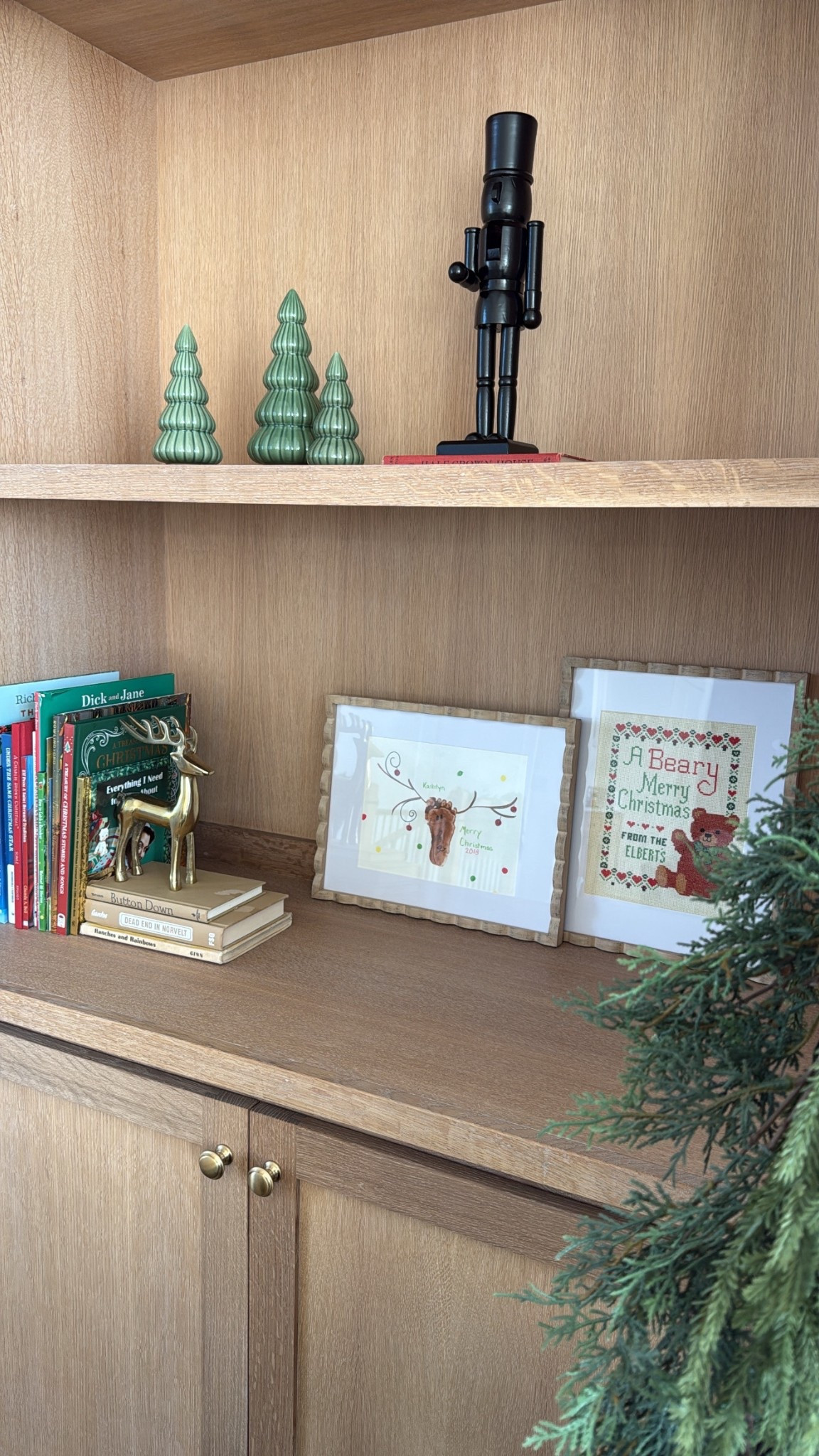 Scalloped wood picture frames and black nutcracker! 

#LTKHome #LTKSeasonal #LTKHoliday
