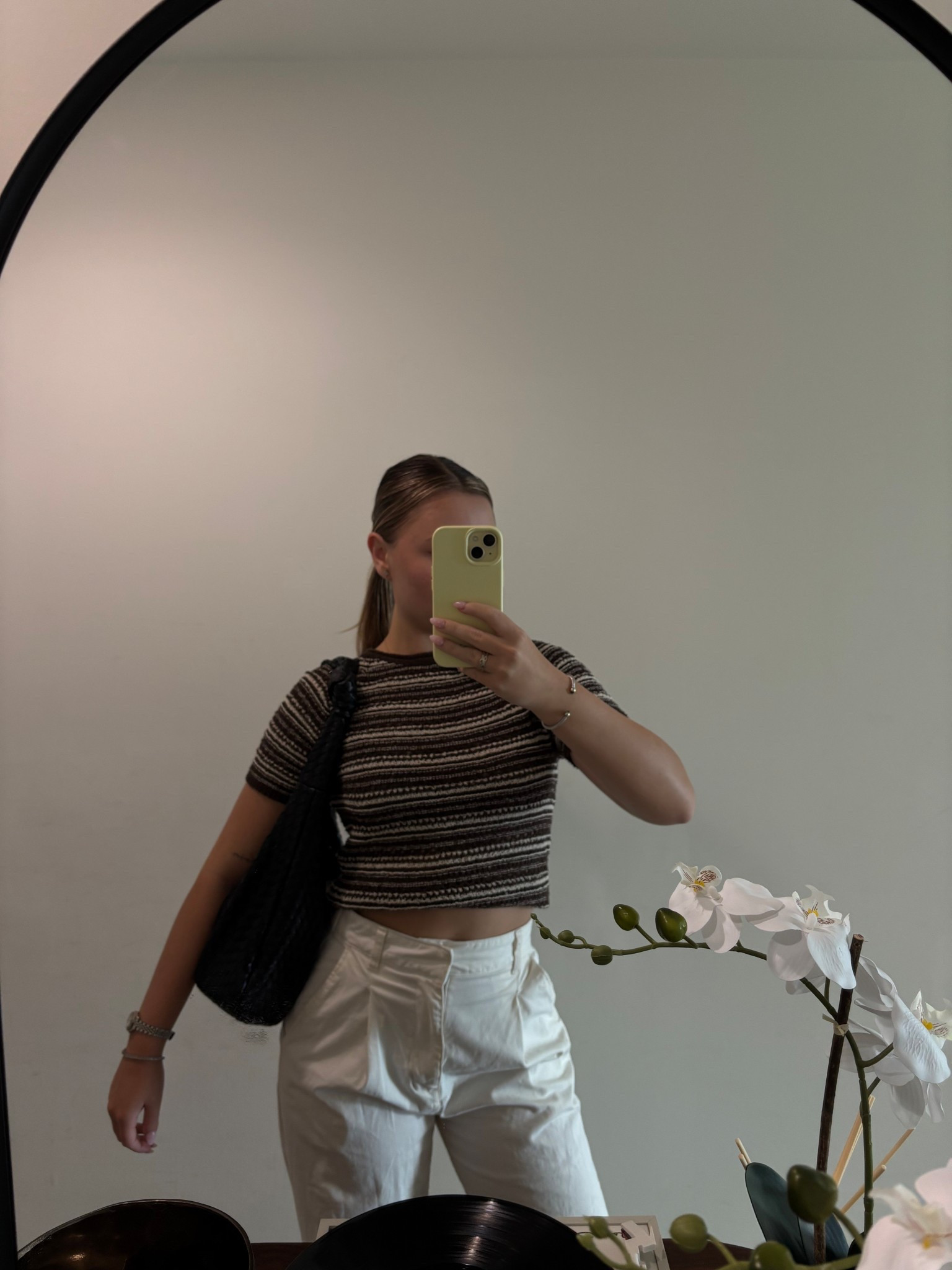 Effortless summer outfit 🤍 Neutral knit top I paired with white trousers. Perfect transitional outfit for brunch to shopping. Lightweight materials, neutral tones, and elevated basics. 

Shop my outfit and similar pieces! 

#LTKstyle #LTKfashion #summeroutfitinspo #neutralstyle #chicandsimple #whitepants #minimalstyle #everydaychic #summerwardrobessentials #ootd 
