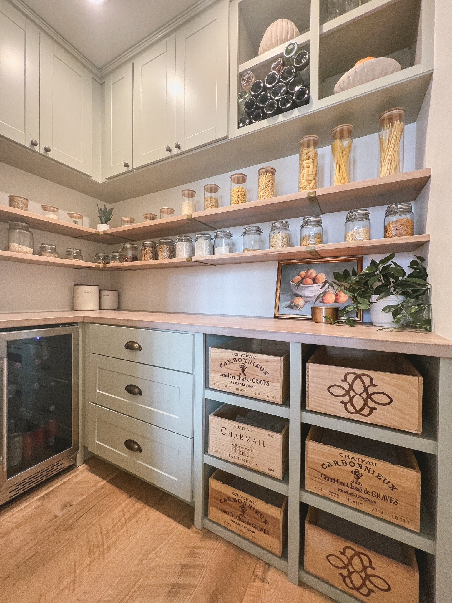 Our built in (affordable) custom pantry!

Custom pantry
Pantry design
Home decor
Pantry layout
French country pantry
Wine box drawers
Faux plants
Pantry organization 
Glass jars storage

#LTKHome
