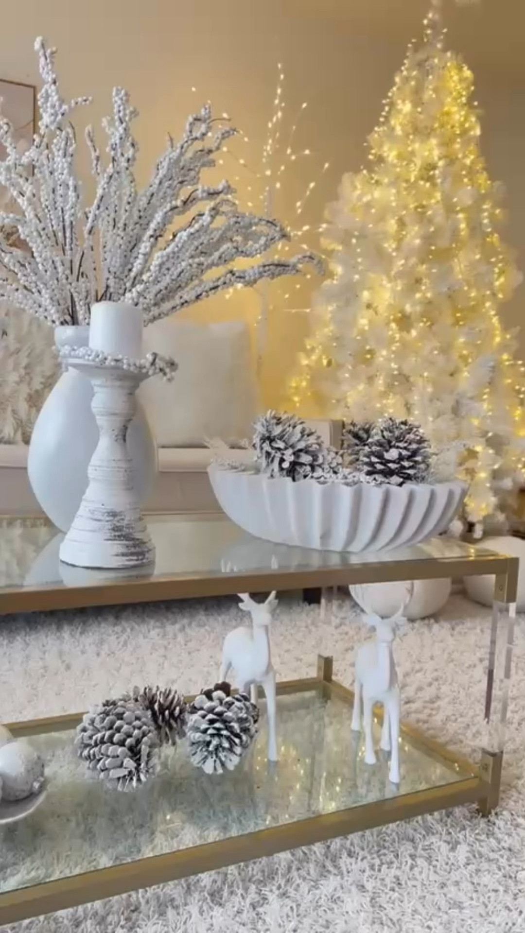 	A classic white Christmas tree, glowing softly with twinkling lights.

#LTKHome #LTKSeasonal