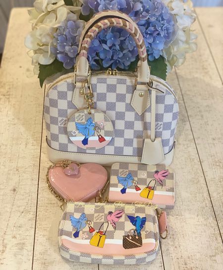 Happy Saturday and Day 20 of Bag Switch! Decided to use my LV Alma BB in Damier Azur with my Christmas Animation bag charm, mini pochette, zippy coin and heart coin purse. 

#LTKstyletip #LTKitbag