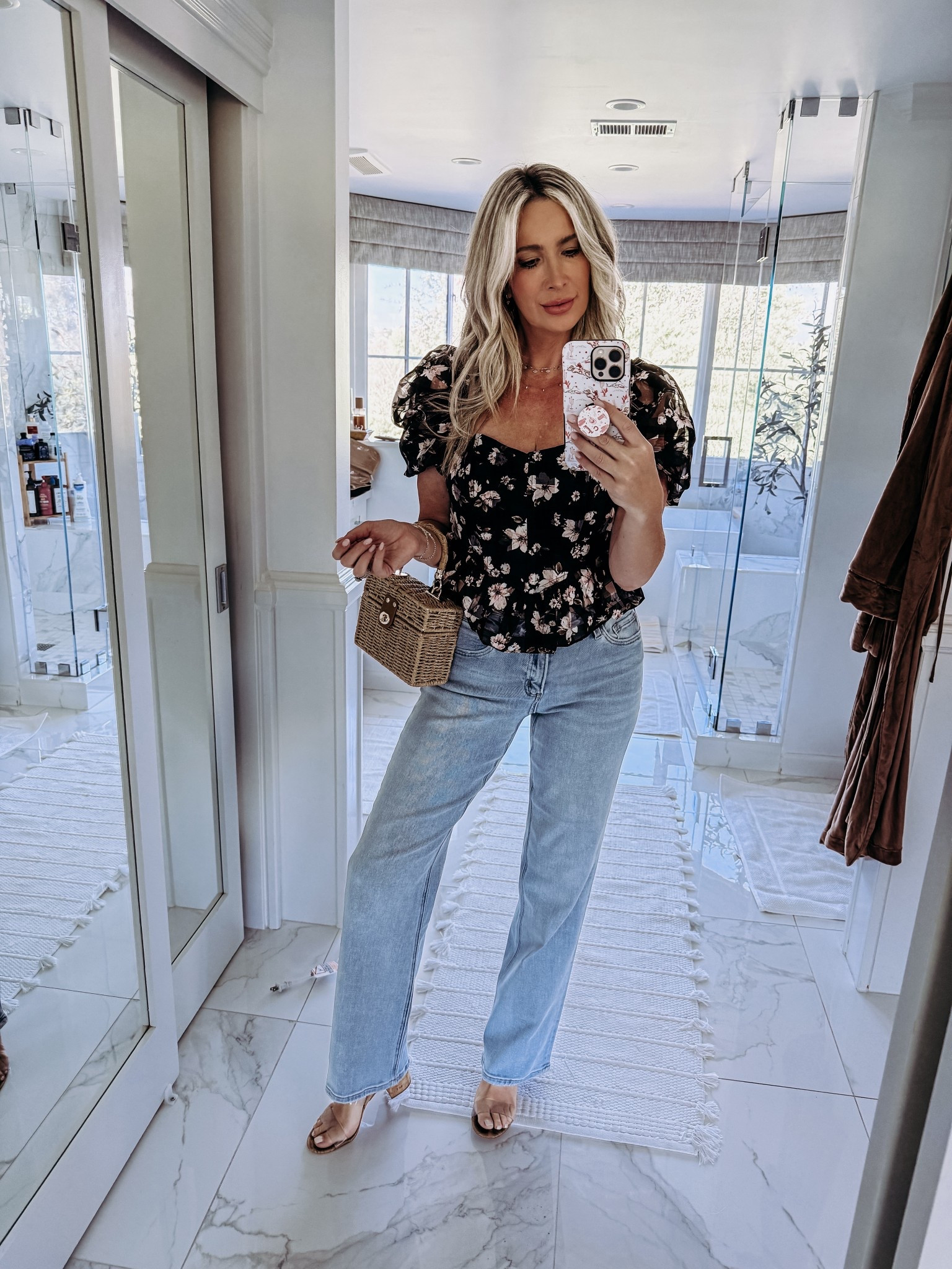 Cute summer outfit! Romantic top with straight leg jeans, rattan bag and sandals. Wearing top in medium, jeans in size 27  

#LTKShoeCrush #LTKStyleTip #LTKFindsUnder50
