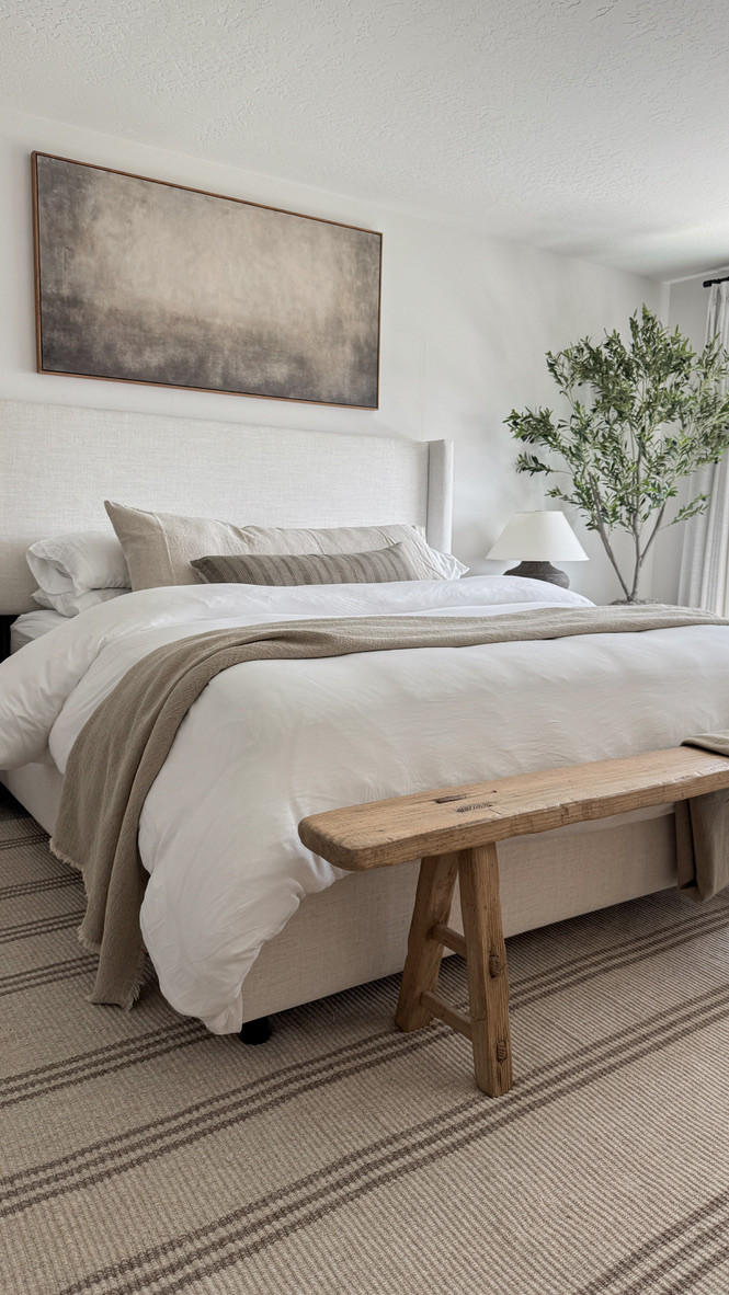 This bedroom has become my favorite corner of the house. The bed and striped rug are both on sale right now, and they truly complete the space. The bed is minimal but still cozy, and the rug is low-profile (perfect over carpet!) while still adding texture and warmth. Styled with neutral bedding, wood accents, and organic shapes for that relaxed, lived-in look.

#LTKHome #LTKSaleAlert