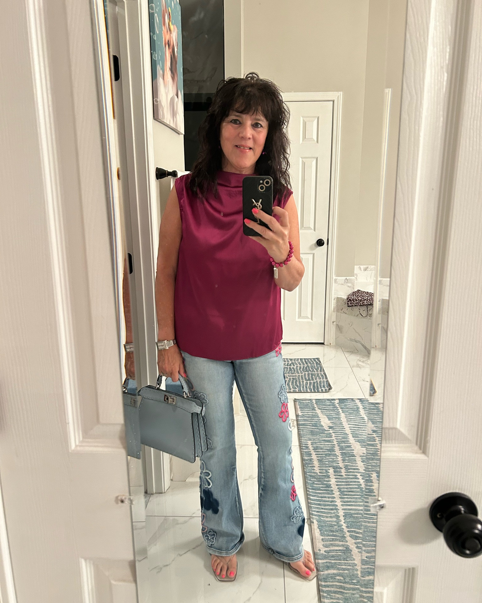This magenta top is so cute with these floral jeans!! Love a bright look that still feels classy and comfy. The gray bag pulls it all together, just a fun little midlife outfit I’m loving today. Always be confident ✨#summerstyle #midlifefashion #fashionover50 #womenover50 #ootd

#LTKMidsize #LTKOver40 #LTKootd