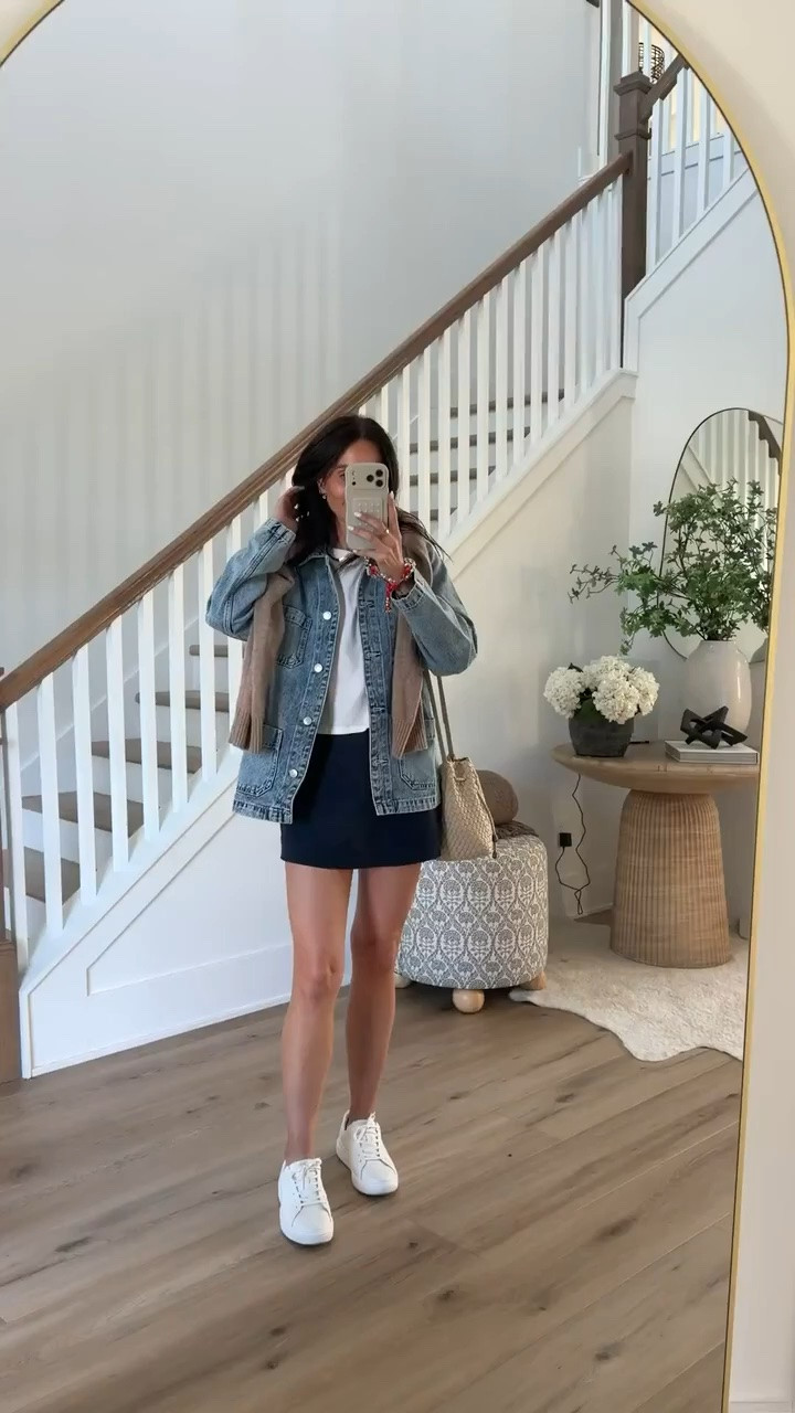 This outfit is such a good example of elevated casual style. The denim jacket layered over the shoulders gives it that effortless look, while the navy skort and white top keep it classic and easy to wear. Perfect for travel days, weekend errands, or cheering from the sidelines.

Denim jacket outfit, navy skort outfit, casual summer style, everyday outfit inspiration, travel outfit, comfortable fashion, elevated basics, white sneakers outfit, sporty chic style, weekend outfit, summer wardrobe staples, annabrstyle

#LTKootd #LTKOver40 #LTKSeasonal