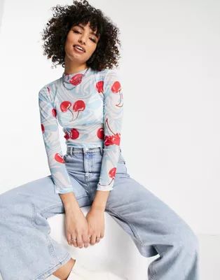 ASOS DESIGN recycled blend fitted mesh top in wavy cherry print | ASOS (Global)