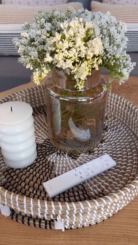 Faux flowers
Vase
Candle
Coffee table decor 

#LTKVideo #LTKstyletip #LTKhome