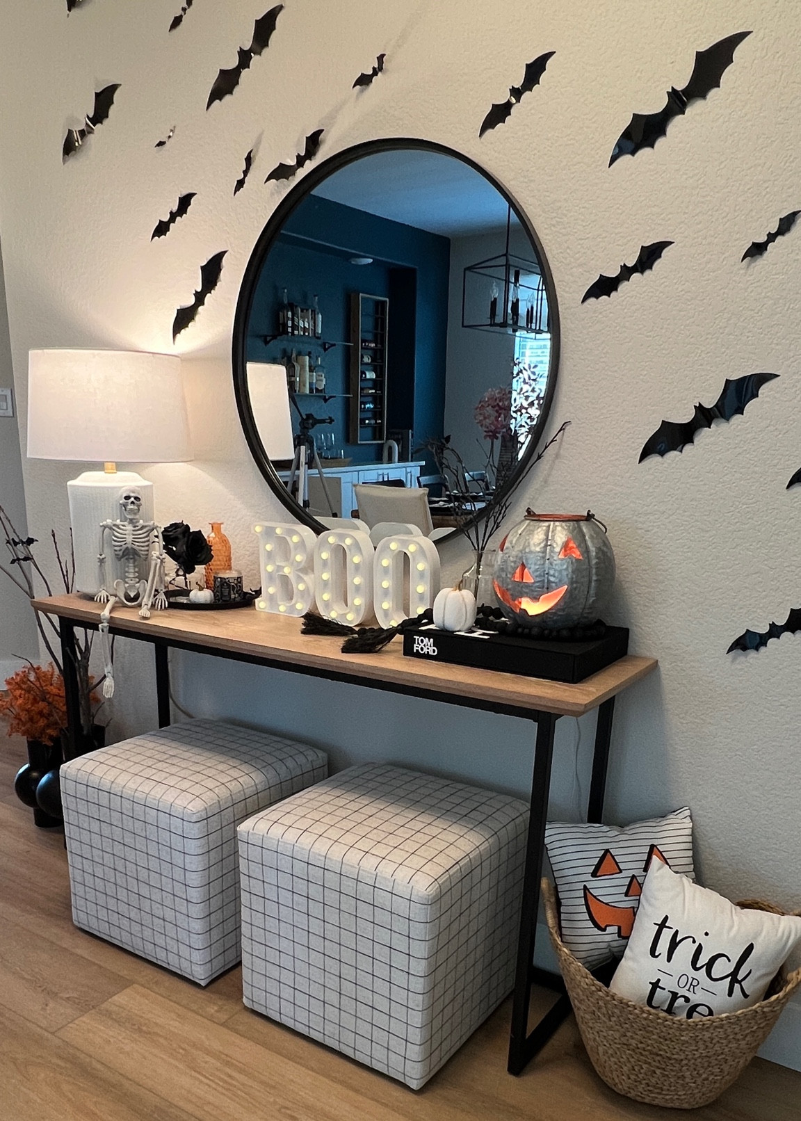 Halloween entryway #consoletable #halloweendecor #ottoman #circularmirror 

#LTKHalloween #LTKhome #LTKSeasonal