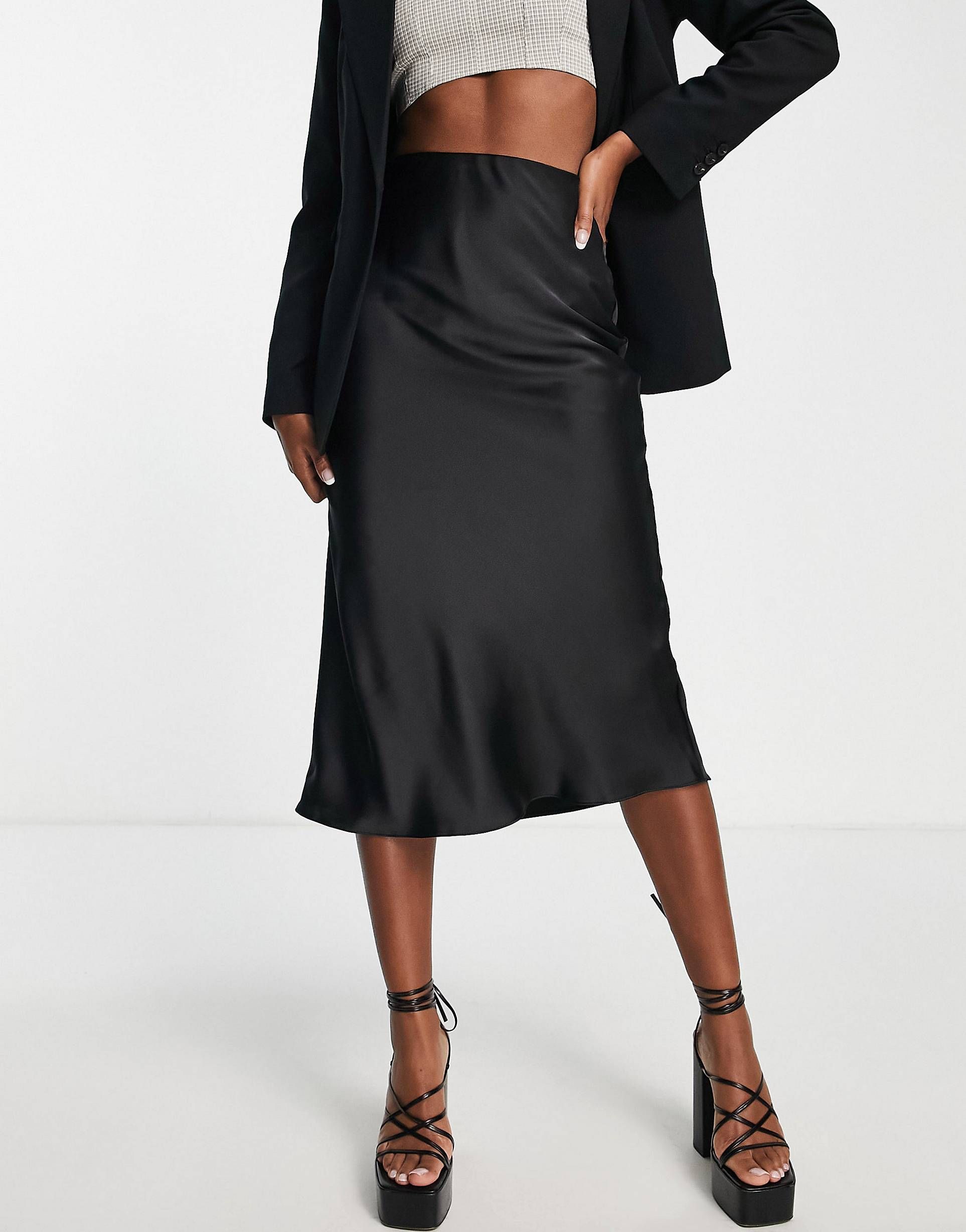 ASOS DESIGN satin bias midi skirt in black | ASOS | ASOS (Global)