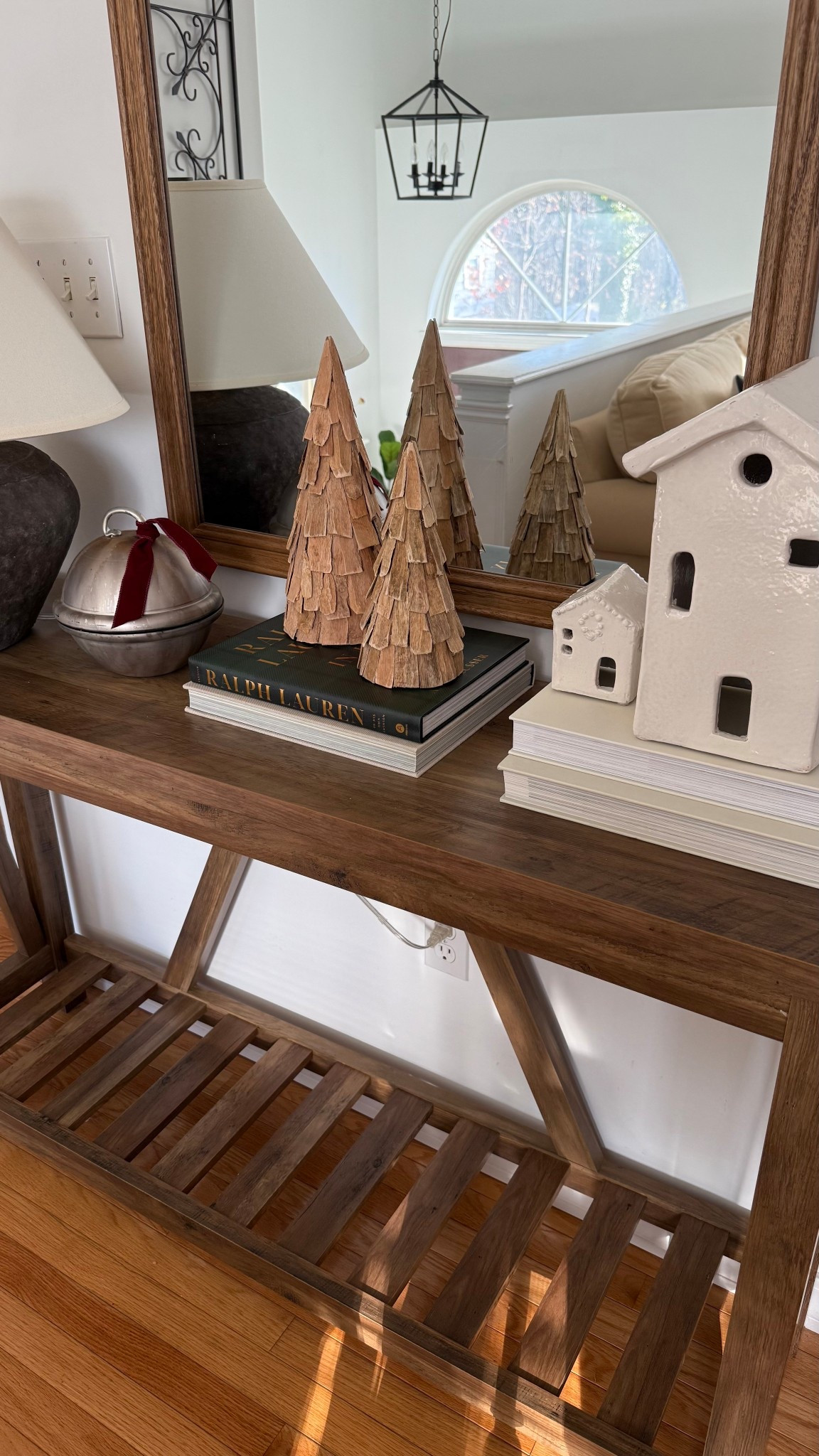 Holiday console table styling
Christmas decor 
White ceramic houses 
Pottery barn 


#LTKHome #LTKHoliday #LTKSeasonal