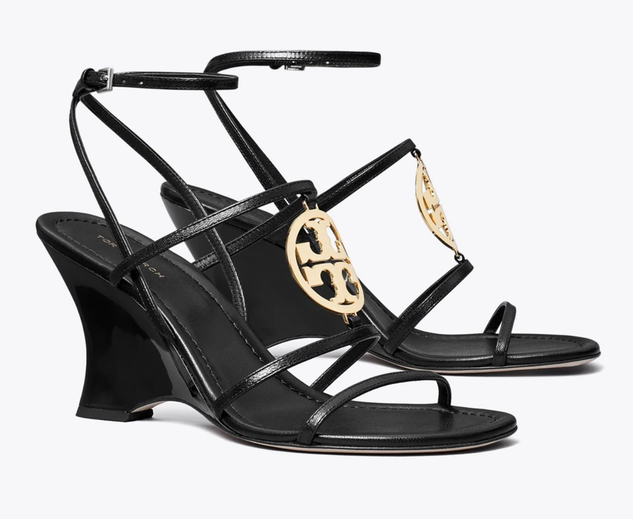 Don’t you just love my latest purchase?  This Capri Miller wedge sandal combines refined style with everyday comfort. Crafted in leather with a cushioned footbed, the elegant sandal is detailed with an oversized Tory Burch metal coin. They are a perfect match for the earrings and belt I received for my birthday in February. Can’t wait to level up a fit with the trio. 

#LTKSeasonal #LTKGiftGuide #LTKShoeCrush
