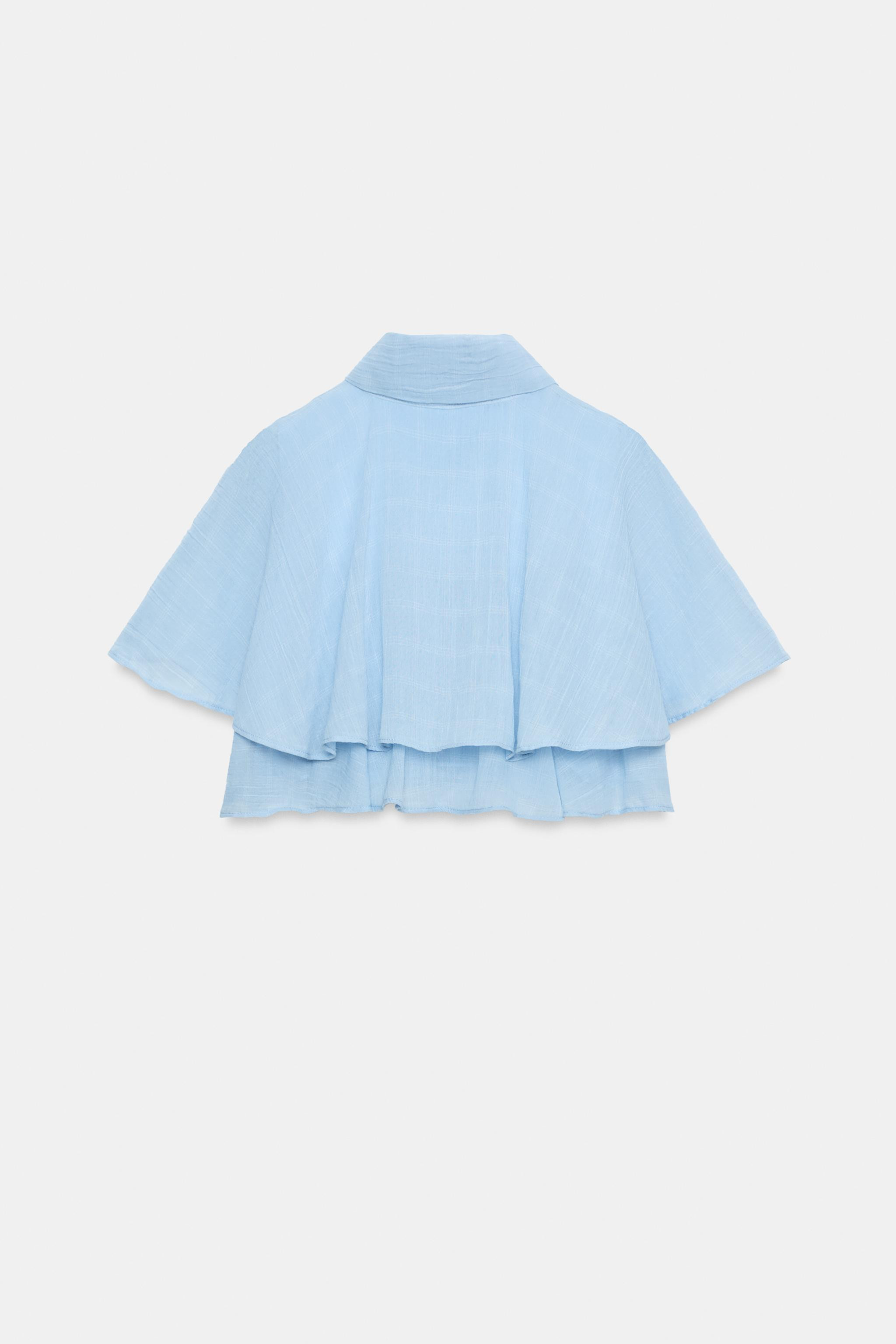 Lapel collar shirt with cape-style short sleeves. Ruffle detail. Front button closure. | Zara US