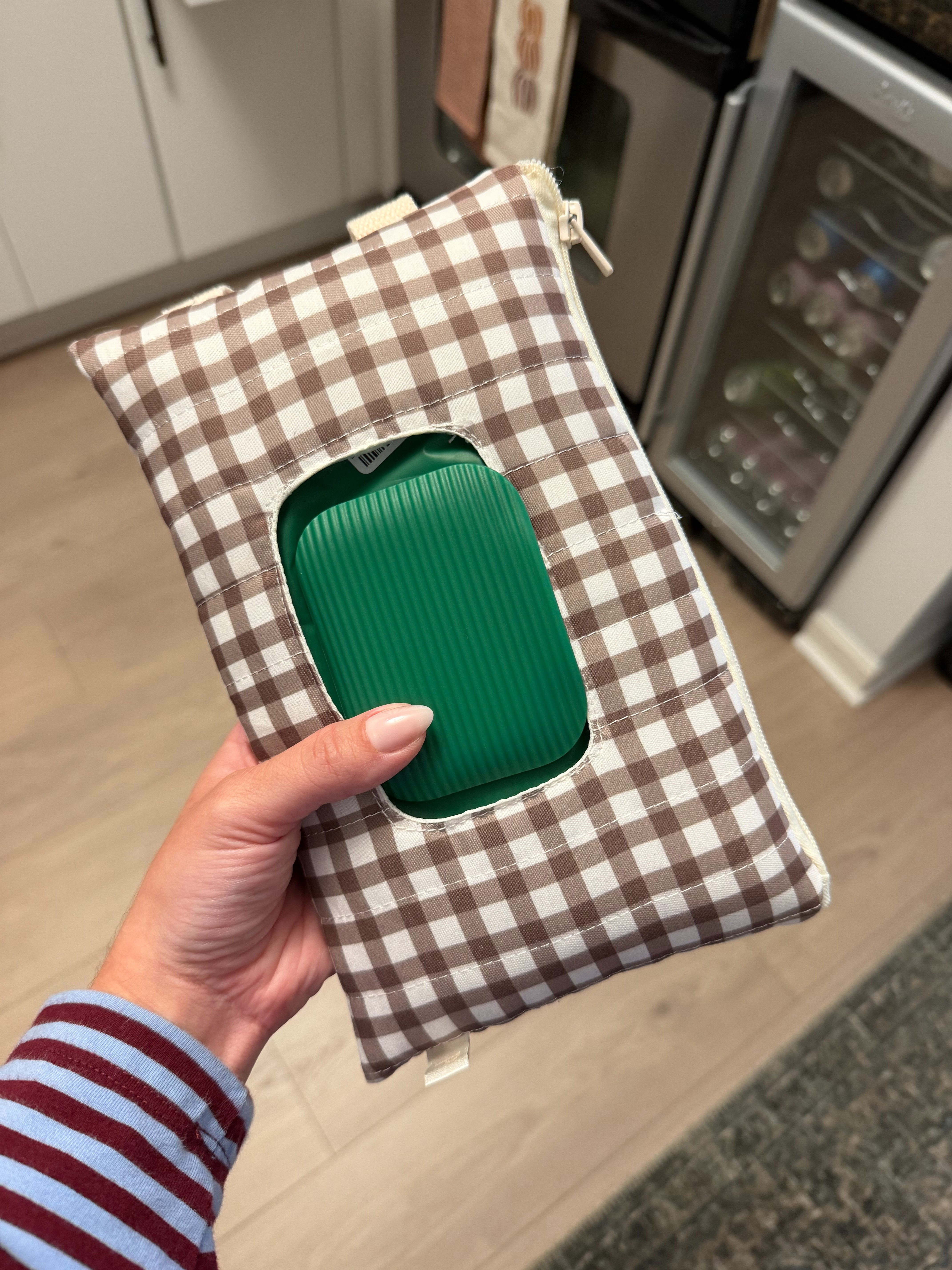 Dog mommas!! A very random but very satisfying little upgrade! Why does putting an everyday essential in a cute gingham pouch make me feel like I have my life together? It's the little things.

How CUTE is this chocolate gingham wipe case?! I'm not a human mom, but I couldn't pass this up for Louis' grooming wipes! Living in the city, wiping paws after every walk is a MUST, so I keep this hanging on the hooks by my entryway for easy access. Such a cute and practical little find for fellow dog moms! And of course human moms! 

 #LTKmomlife #LTKSeasonal