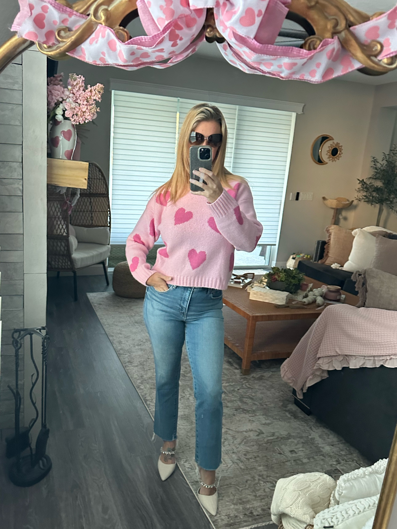 Love the heart sweater and all things pink and red for Valentine’s Day then shop these amazing jeans they truly fit so good and drape off the body perfectly #jeans #denim #hearts #sweater #heartsweater #kohls #celine 

#LTKFindsUnder100 #LTKOver40 #LTKStyleTip
