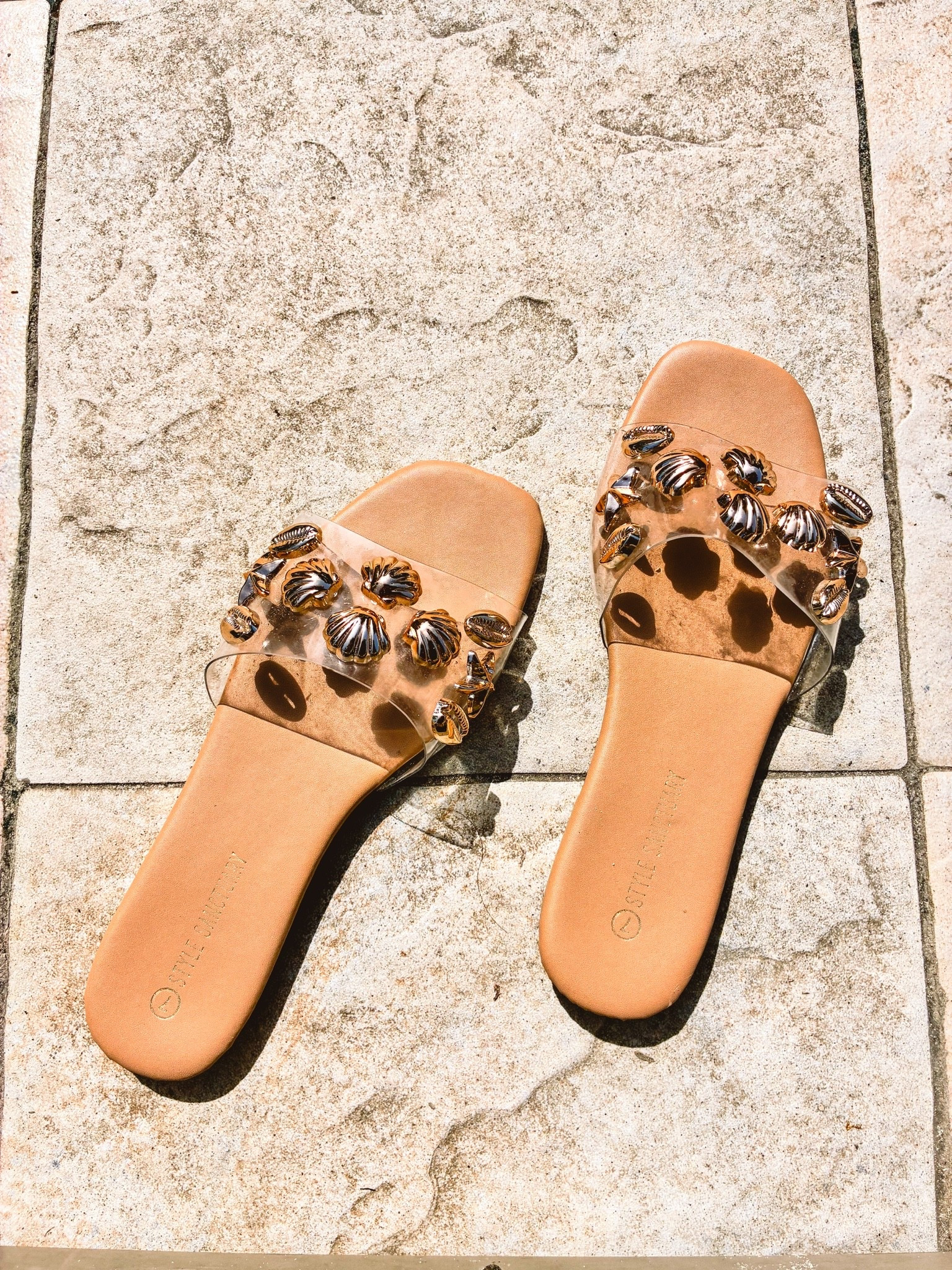 Vacation-ready details ☀️🌴

These clear sandal slides with gold seashell accents are the perfect finishing touch for any resort look. Lightweight, easy to style, and made for warm-weather outfits — I’ve been wearing them nonstop for beach days, poolside looks, and dinner by the water.

They instantly elevate even the simplest vacation outfit 🤍

Shop my sandals on LTK 🛍️ 

#LTKStyle #VacationStyle #ResortWear #SummerShoes #BeachOutfits

#LTKootd #LTKTravel #LTKSwim