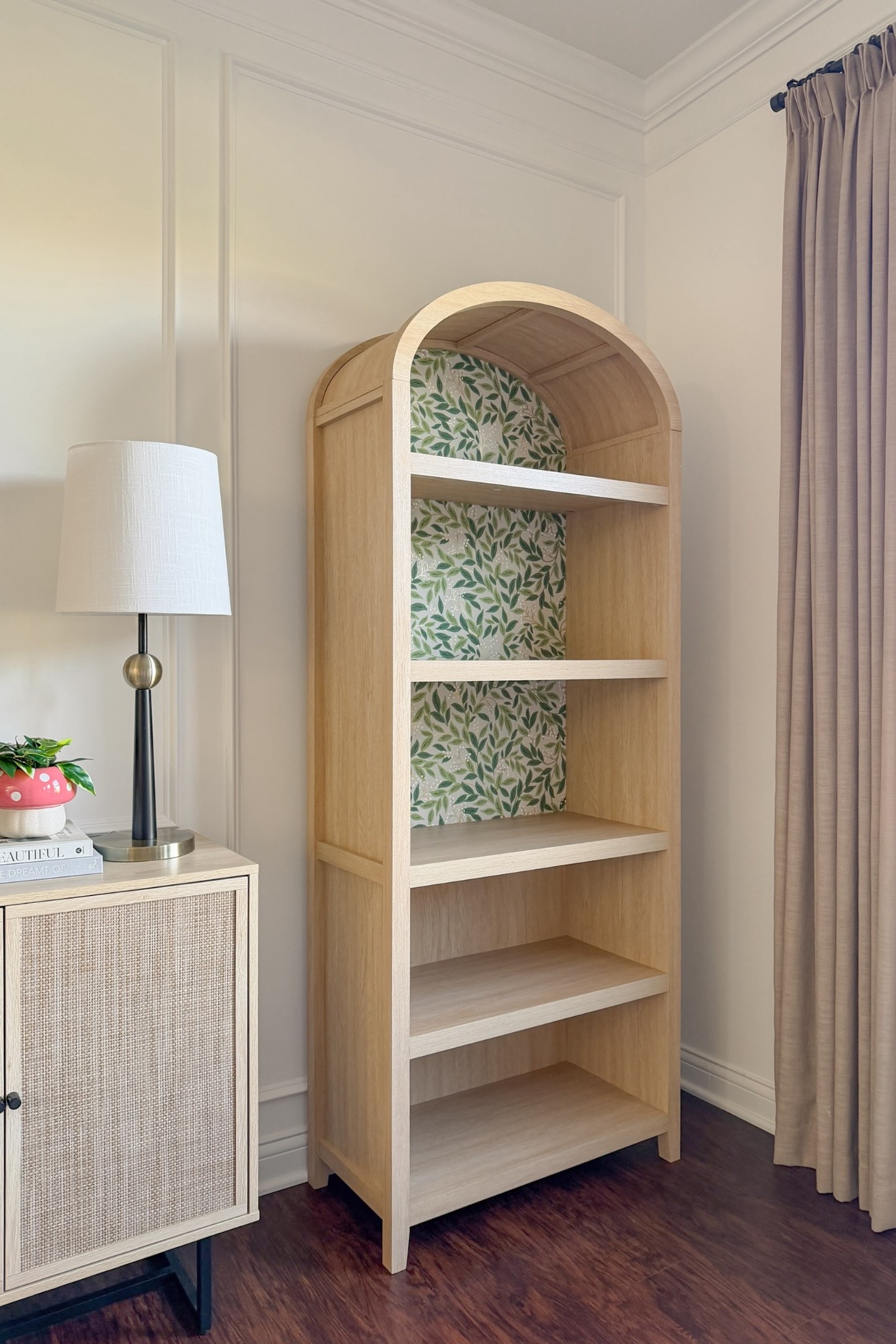 This is your sign to wallpaper the inside of a bookcase to add color to your living room or reading nook 🍃📖🌼 #ad I recently purchased this arched bookcase from @Wayfair and added my favorite peel and stick wallpaper for a bit of whimsy. Happy spring! 🍄🧚🏼‍♀️

#wayfair #wayfairpartner

#LTKHome #LTKSeasonal #LTKdayinmylife