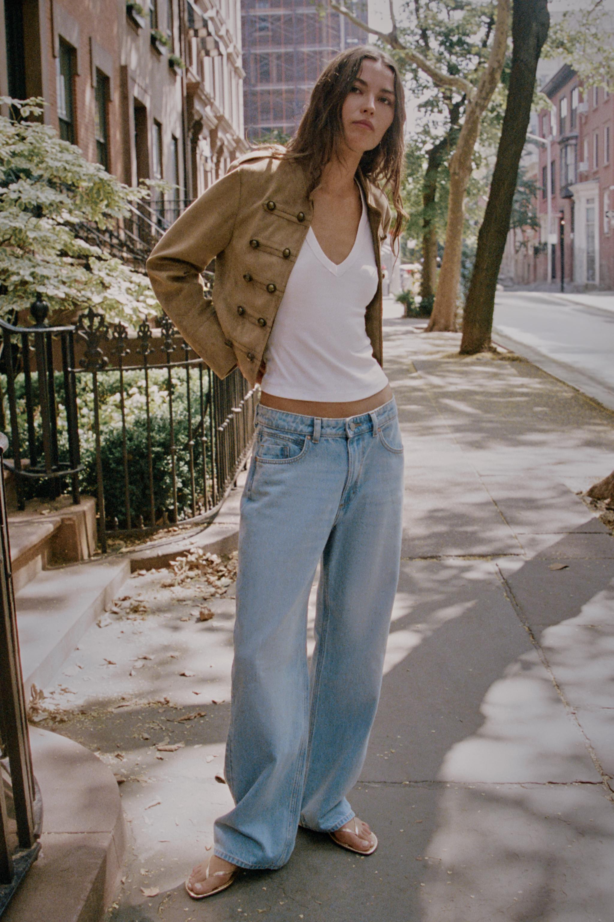 Faux-suede jacket featuring a high collar and long sleeves with shoulder tabs. Faux front button ... | Zara US