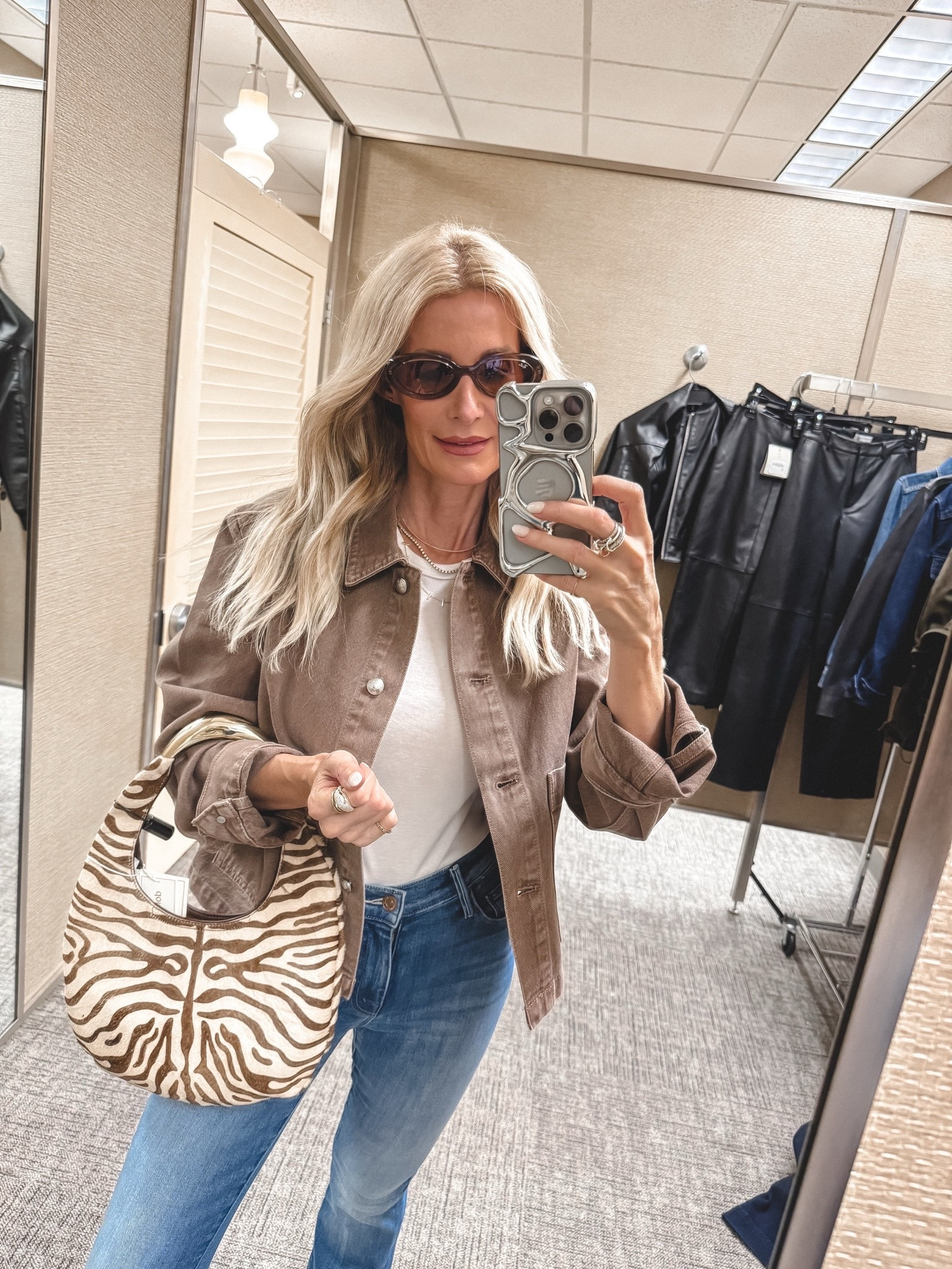 FOUND >>> The Chicest zebra-print handbag part of the NSALE! It's the perfect way to add interest to a simple fall outfit — I love how it pops against the brown jacket and classic denim while still feeling chic, neutral, and wearable. It’s such an easy statement bag to throw on with your everyday basics when you want the whole look to feel more styled. I’m wearing an XS in the jacket and a size 24 in the jeans. #LTKStyleTip #FallOutfits
 

 

#LTKOver40