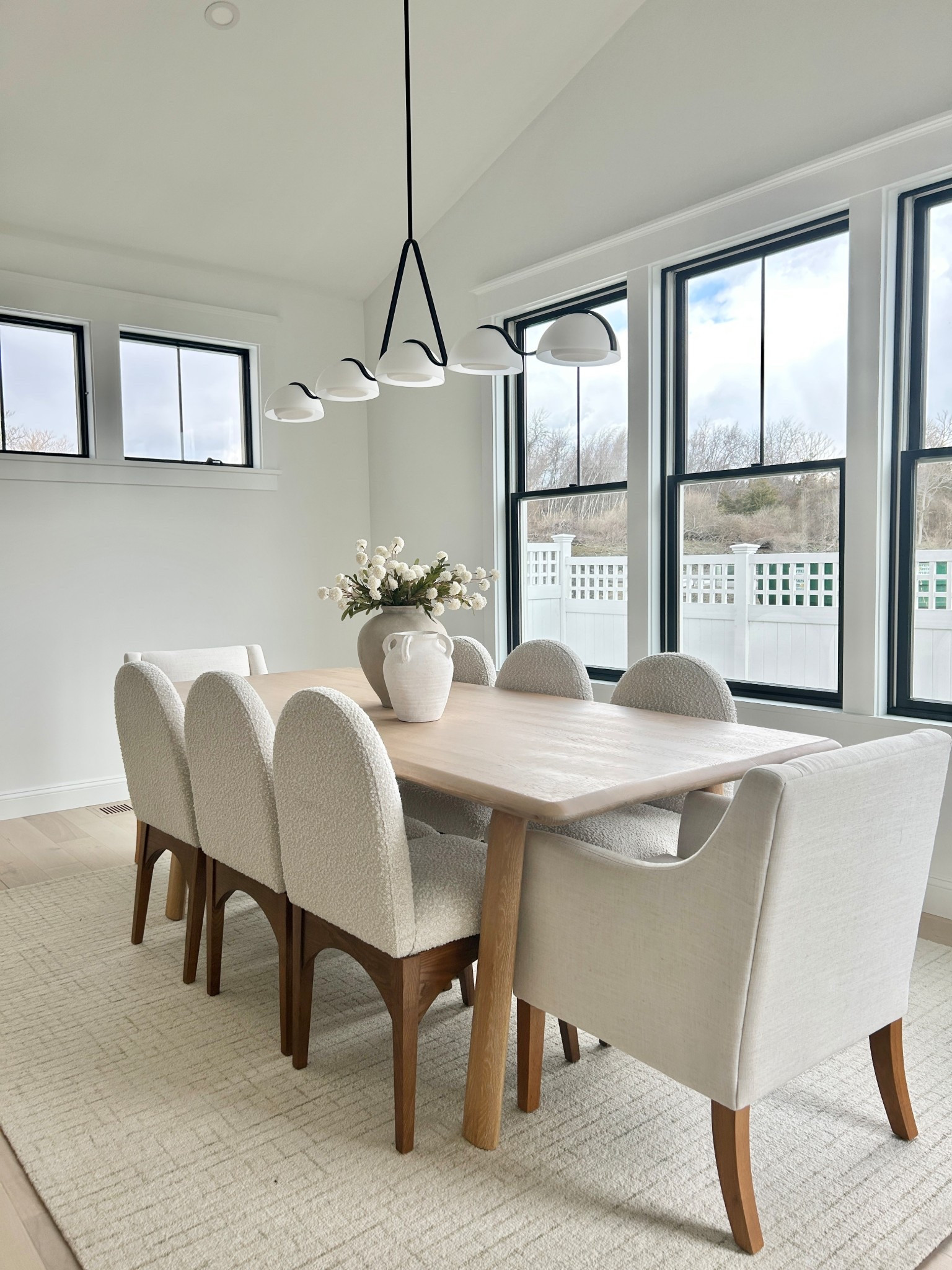 Elegant dining room.  Rounded dining chairs, light wood dining table.  Seating for 8.

#diningtable #diningchair