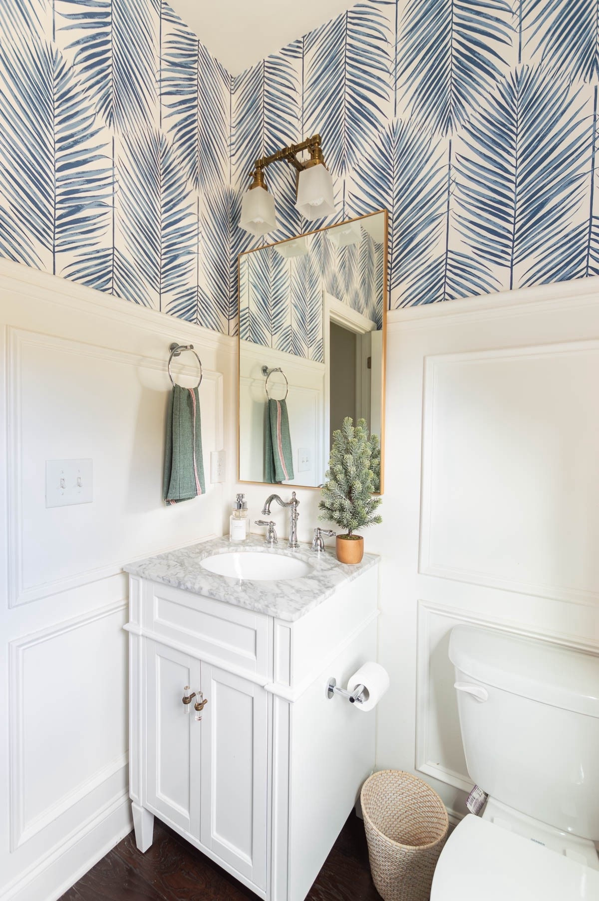 Forever simple, I’m still not tired of my blue and white powder room and just added a couple of touches for the holiday season, including a miniature Christmas tree and a flour sack hand towel.  home decor Christmas decor coastal powder room bathroom decor small white vanity

#LTKStyleTip 

#LTKHoliday #LTKHome