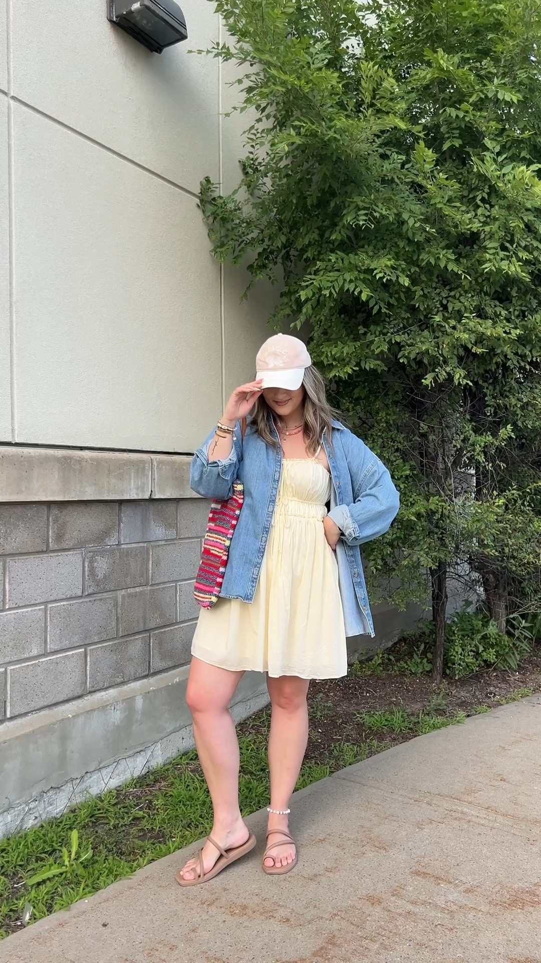 Easy summer outfit! My butter yellow dress is old from aerie, but I linked a super similar option! Wearing my usual size L in the denim shirt. Crocs sandals are super comfy, I’m a 9.5-10 shoe and wear a 10. Canadian shirt, sandals, and bag links are under “similar products”

#LTKsummer #LTKmidsize #LTKdresses