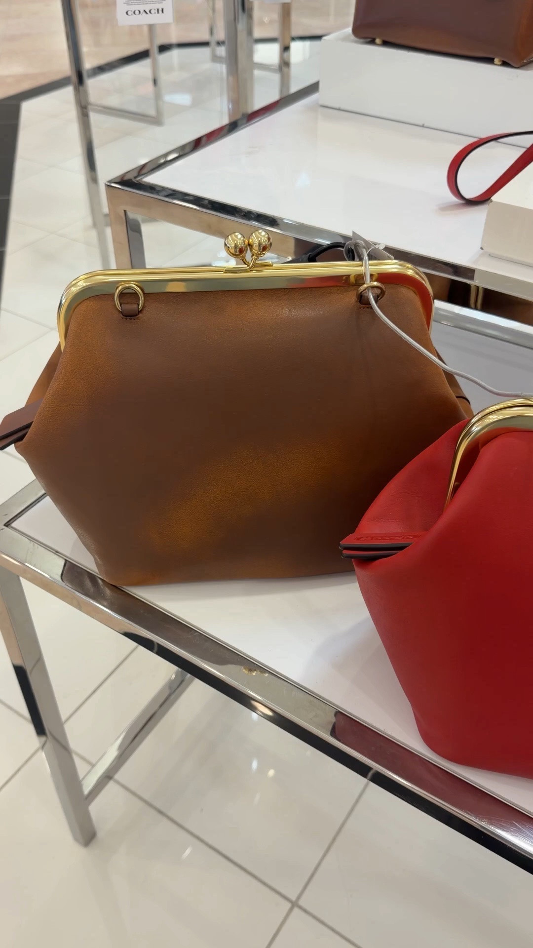 Love this new coach kisslock in the poppy color

#LTKOver40 #LTKootd #LTKCon