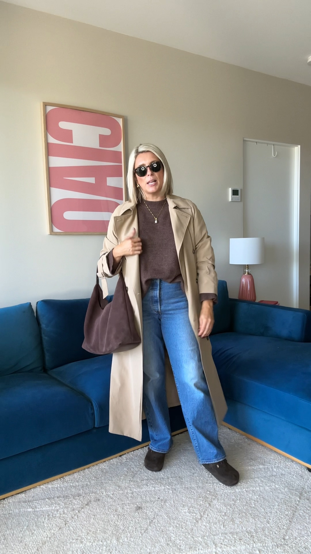 Casual winter style with a chocolate brown knit, blue jeans and a trench coat  

#LTKaustralia #LTKwinter #LTKpetite