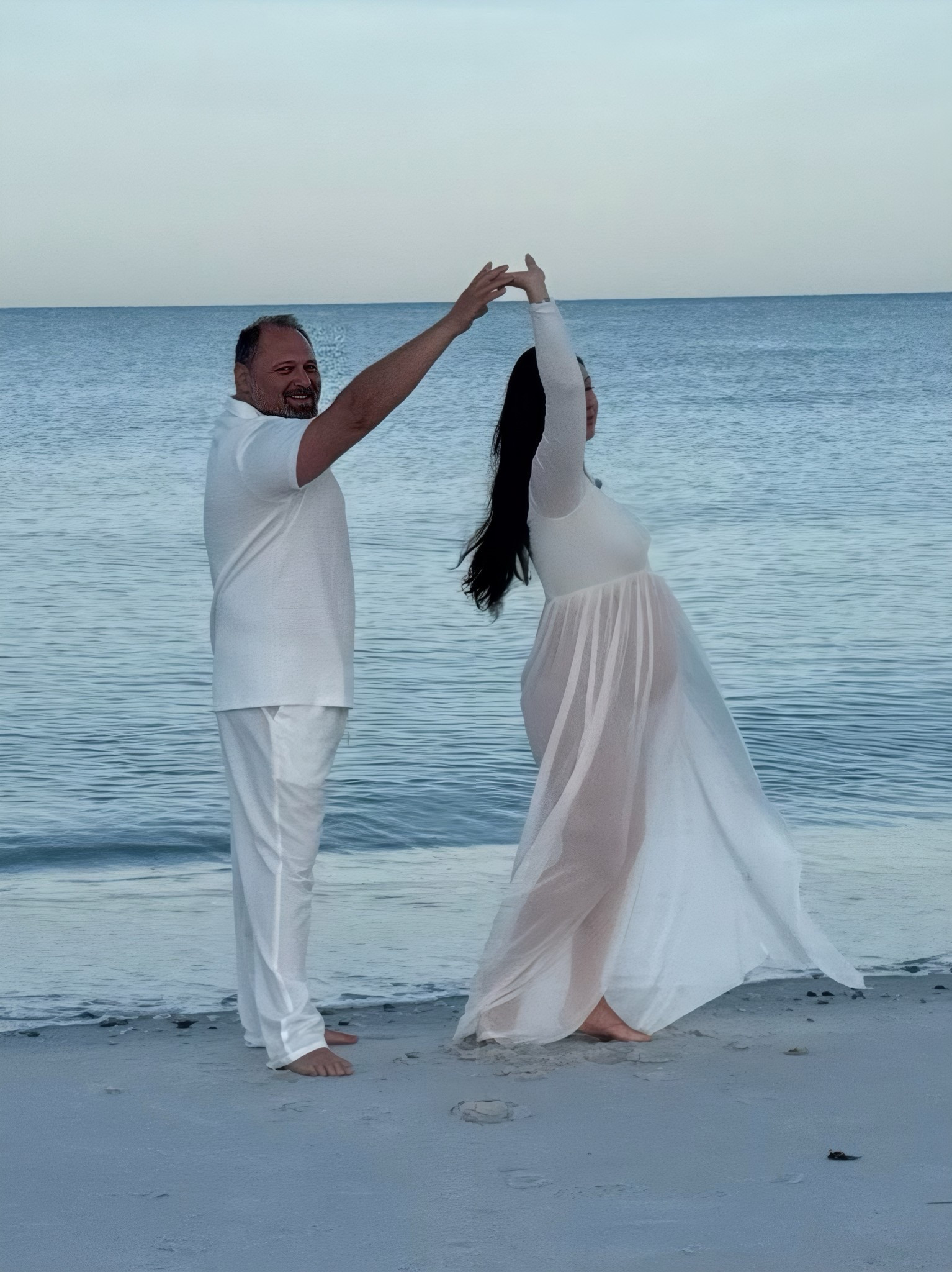 This all white sheer skirt , off shoulders dress was a perfect outfit addition for my all white maternity beach photoshoot! 
White sheer maternity dress found on Amazon. 

#LTKFindsUnder50 #LTKFamily #LTKBump