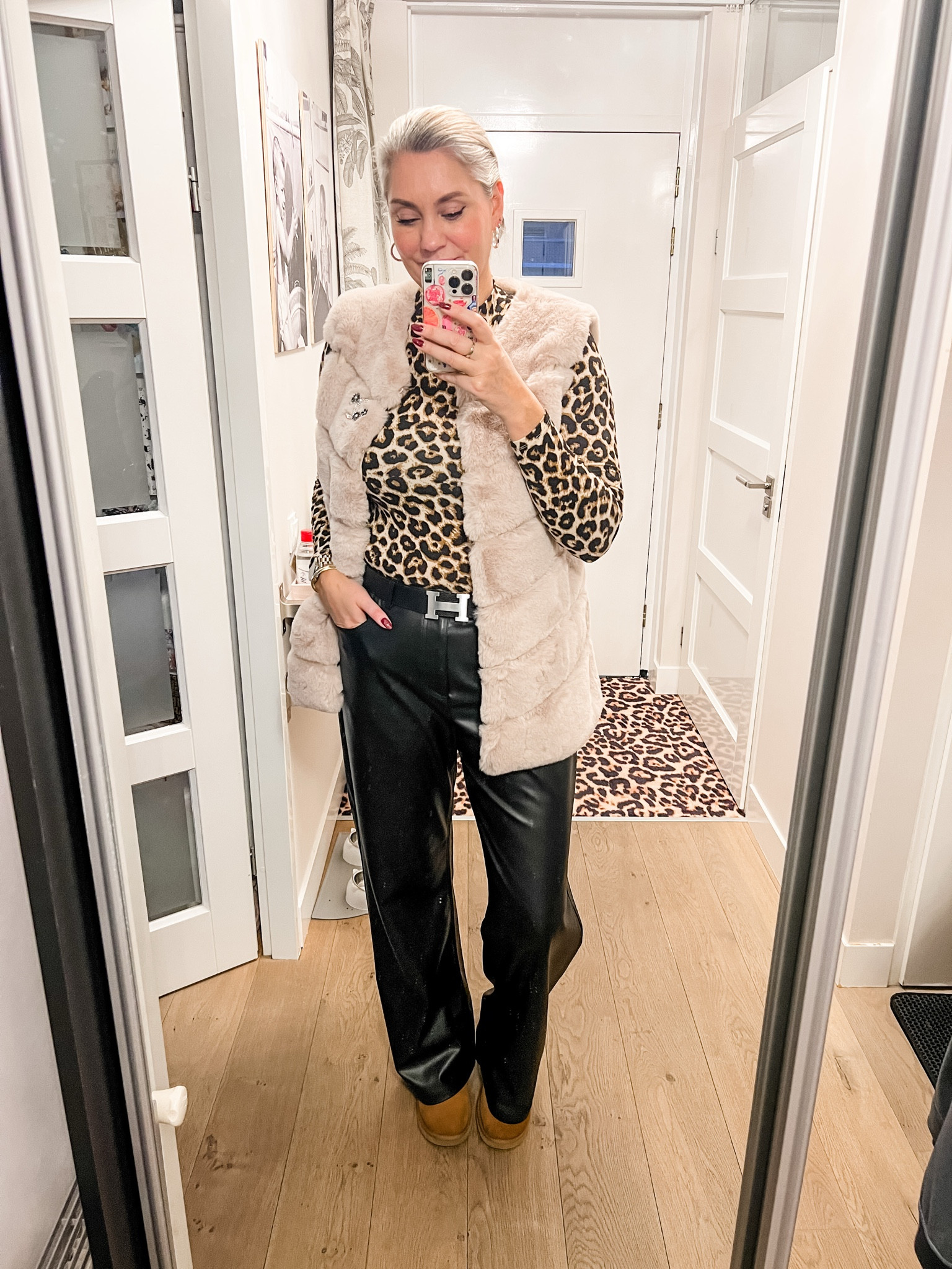 Ootd - Thursday. Wide leg faux leather trousers (old, Zara), leopard print top, faux fur bodywarmer (local boutique), leather belt and Ugg boots, CC brooch. 



#LTKnederlands #LTKwinter #LTKeurope