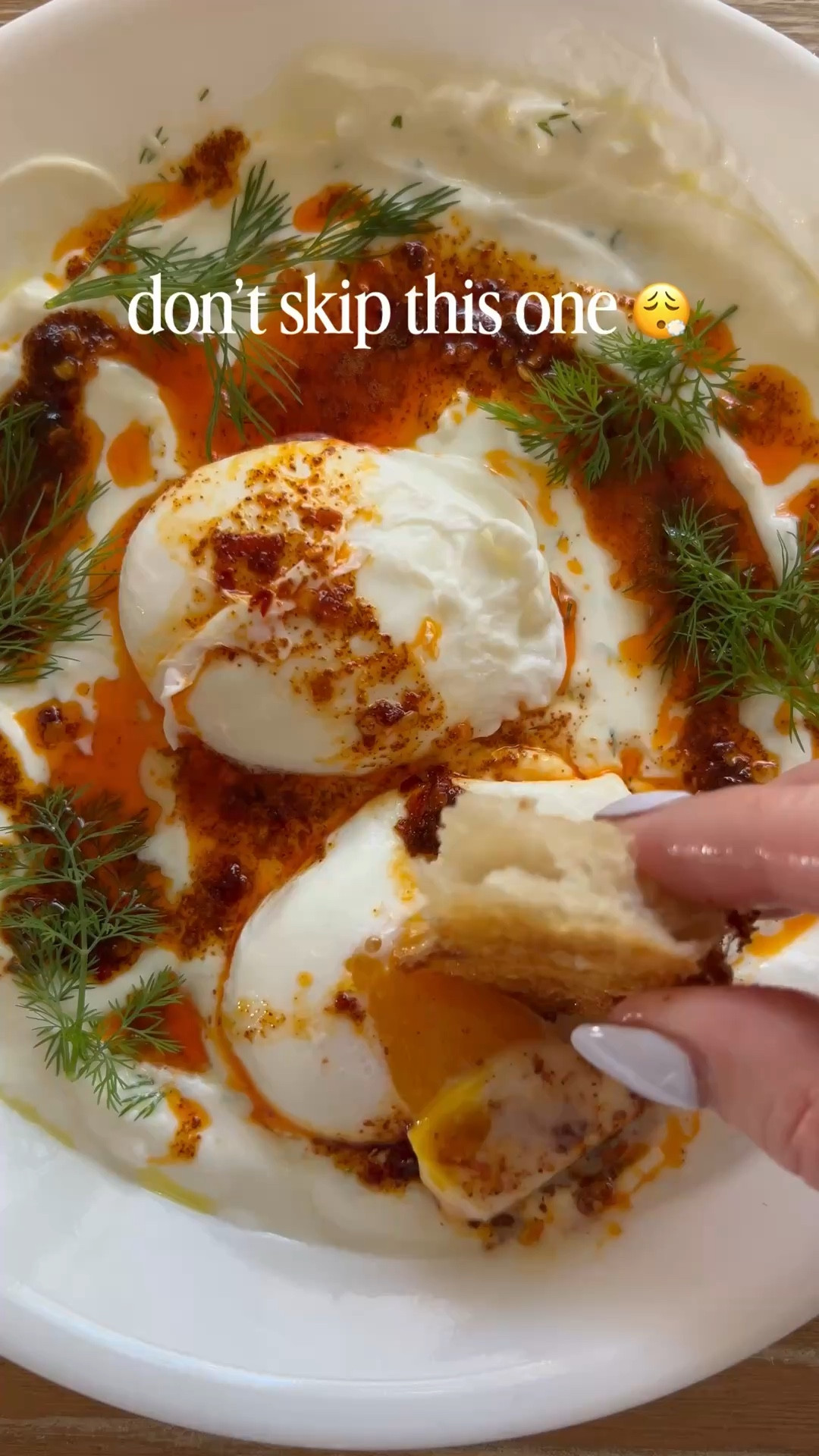 don’t skip this one 😮‍💨

creamy garlic yogurt + perfectly runny eggs + that spicy butter drizzle… this combo is unreal

simple ingredients, high protein, and tastes like something from a restaurant

you need:
• greek yogurt
• garlic
• olive oil
• fresh dill
• pouched eggs
• butter + paprika (chili flakes optional)
• bread for dipping (don’t skip this part 😏)

save for your next breakfast 🤍
aka turkish eggs (çılbır) — and yes, they’re worth the hype !! 

#highproteinrecipes #easybreakfastideas #eggrecipes #foodreels #quickmeals

#LTKvlog #LTKSeasonal #LTKfoodie