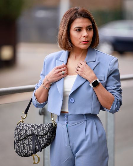 Cropped Blazer in Blue Drape Pants in Blue White Gucci Sneakers Dior Saddle Bag Pandora Bracelet Pandora Ring Everyday Simple Outfit Spring Outfit Work Outfit

#LTKstyletip #LTKeurope #LTKSeasonal