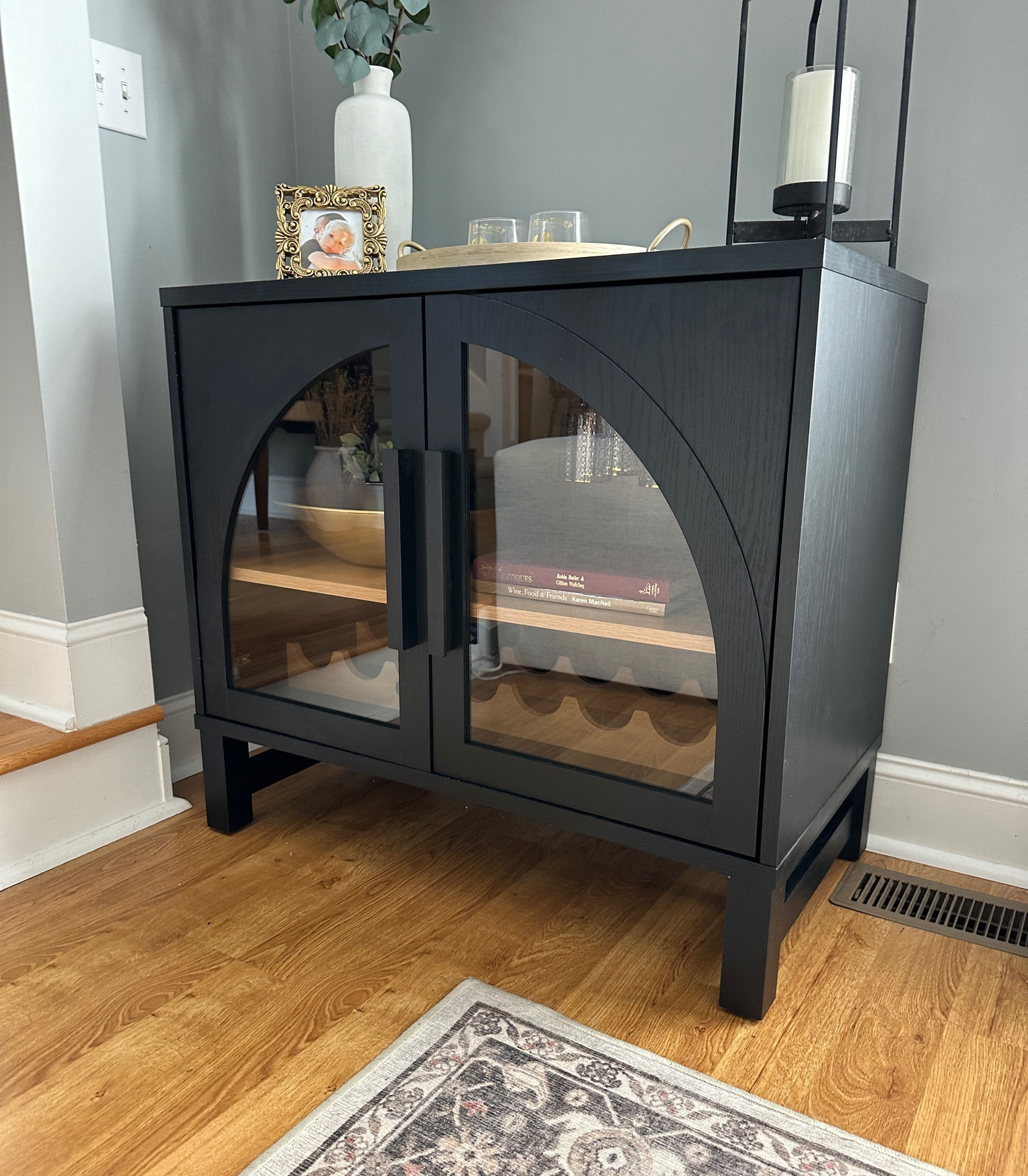 $118 arch glass cabinet / bar cabinet!

My mother in law just got this and it is so good in person - much bigger than I thought too! It comes with slots for wine bottles and glasses, but you don’t have to install those if you prefer to just use as a cabinet.  Would be really pretty with two pushed together too!

Walmart home finds | Affordable home decor | affordable finds | budget friendly home decor | decorative cabinet | sideboard | dining room furniture 

#LTKHome #LTKSaleAlert