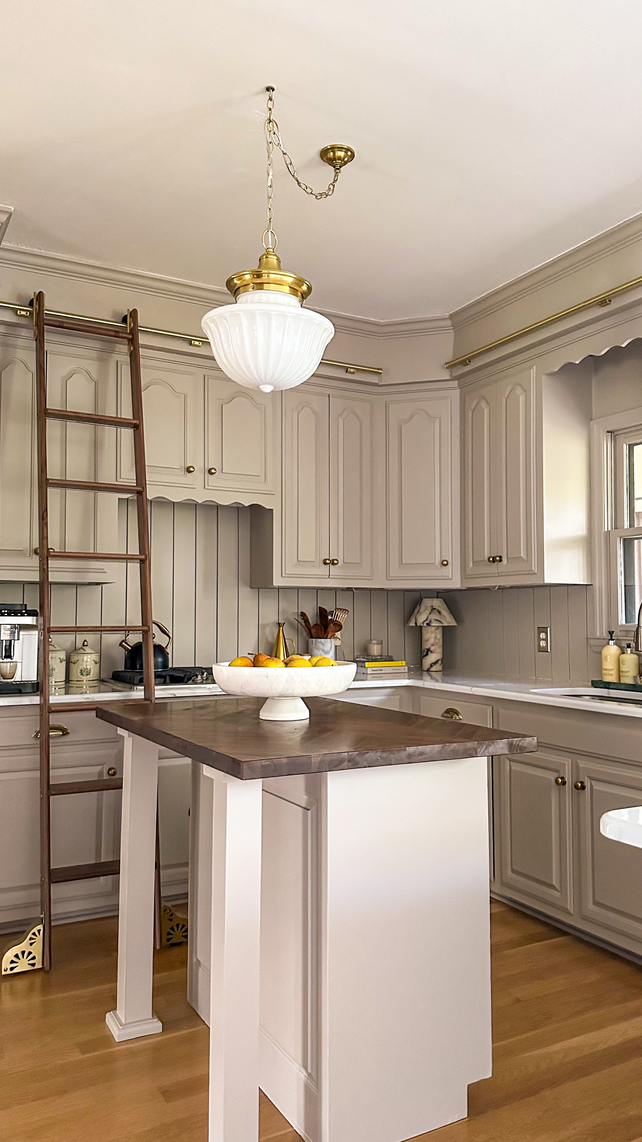 Looking for the perfect warm neutral paint color? You’ll want to save this for later!

Last year I painted my kitchen cabinets Stone Hearth by Benjamin Moore. It’s the perfect moody taupe that adds just the right amount of contrast in my kitchen. It feels like a warm hug ✨

🏡 Follow along with me, @allisonskiffdotcom as I continue to renovate my brick colonial home in Nashville, TN 

👀 Check out all my sources for the kitchen diy renovation as well as kitchen decor

✨

🤍 LIKE and SAVE for future inspo

#diy #paint #neutral #homeimprovement #diyprojects #kitchencabinets #kitchenrenovation #interiordesign 

Moody | Cozy | Cozy Interiors | Moody Aesthetic | Secondhand | vintage | home improvement | renovation | traditional | interior design | design inspo | home decor | antiques | thrifted finds | collected home | thrifting | affordable decor | DIY | facebook marketplace  | FBMP | estate sales | sustainable | upcycle | Nashville

#LTKHome #LTKFindsUnder50 #LTKWatchNow