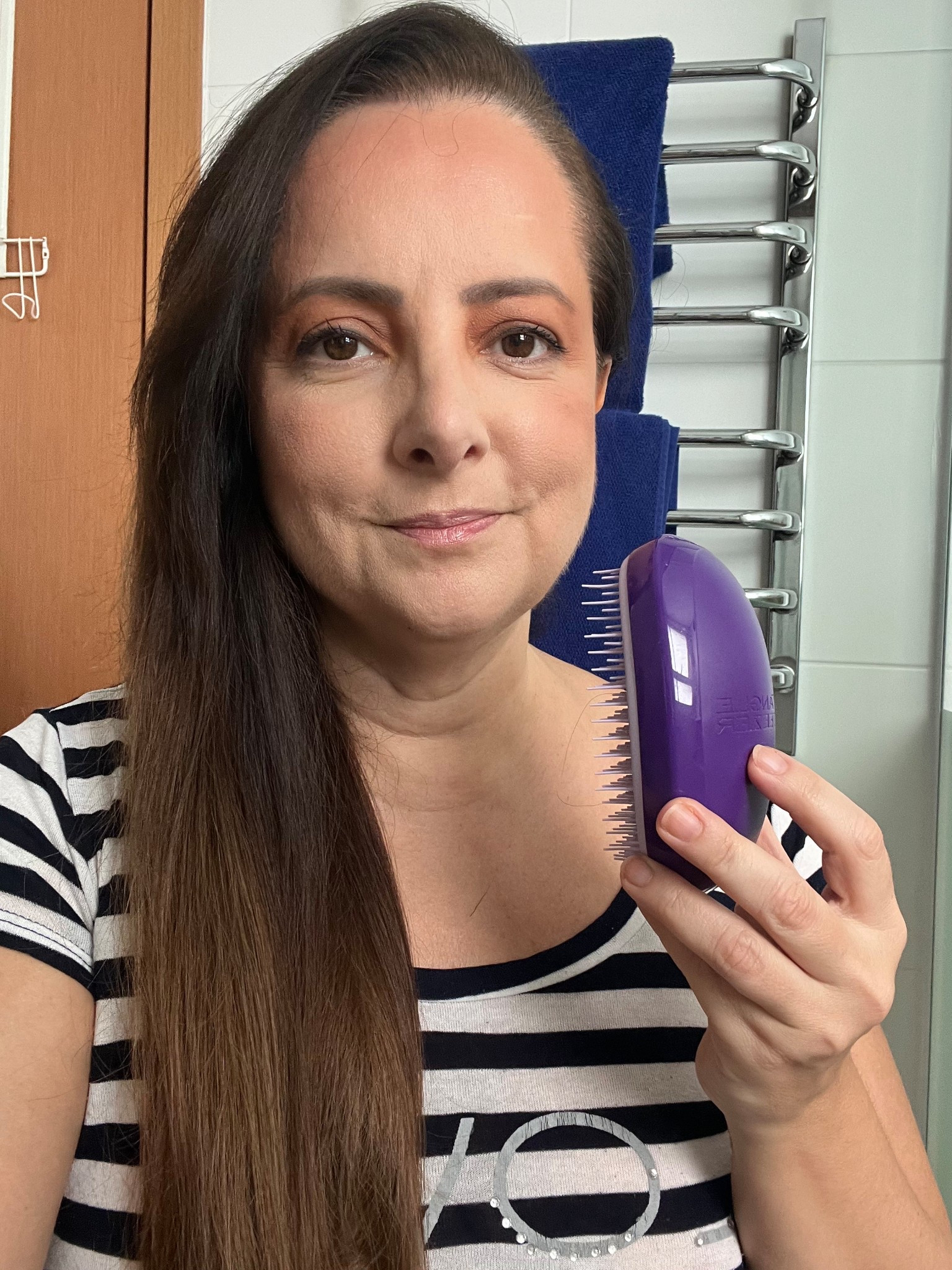 A melhor coisa escova para desembaraçar os fios. Não quebra, evite o frizz e ainda massageia o couro cabeludo.

#LTKbrasil #LTKbeleza