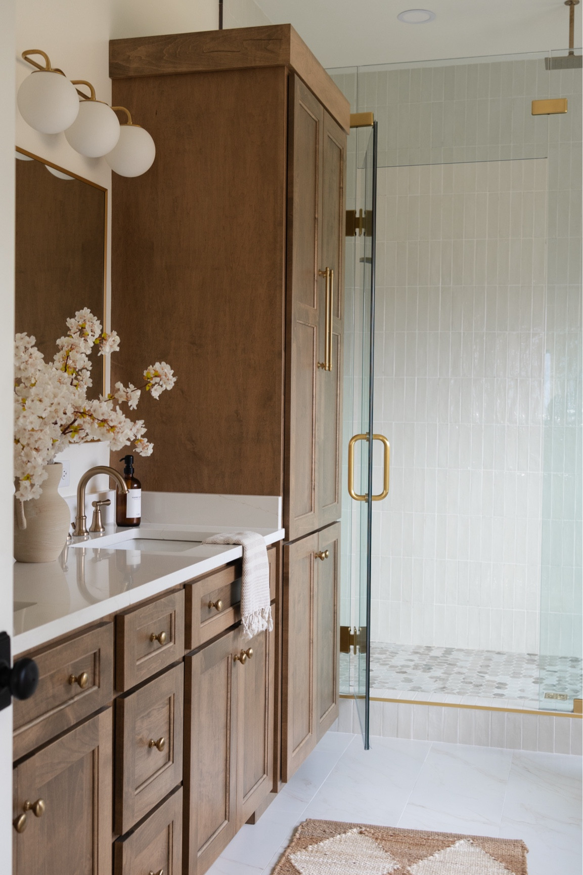 This bathroom feels like calm, clean, timeless luxury. Exactly what we were going for ✨

bathroom design, neutral bathroom, timeless bathroom, bathroom inspo, bathroom remodel, quartz countertops, white oak vanity, bathroom lighting, wall sconces, bathroom mirror, bathroom decor, bathroom hardware, bathroom faucet, tile flooring, shower tile, modern bathroom, classic bathroom, cozy bathroom, bathroom styling, affordable bathroom, bathroom renovation, bathroom favorites, Amazon bathroom finds, LTK home, designer bathroom look, bathroom cabinet hardware, calming bathroom design, warm neutral bathroom, elevated bathroom style, home decor LTK.

#LTKHome #LTKSaleAlert