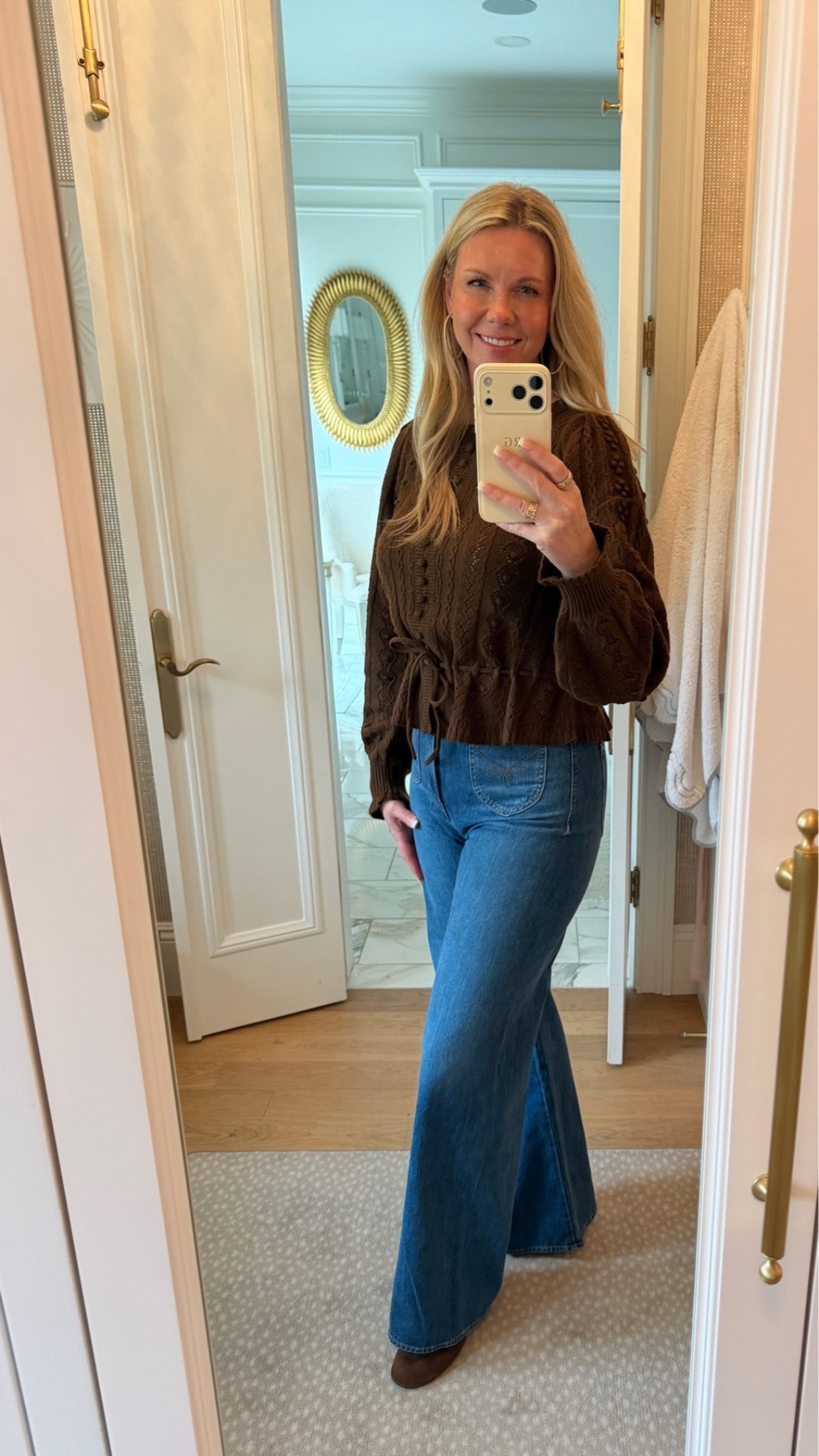 Fall staples for your closet! This brown sweater has so many charming details. Im wearing a medium and runs slightly large. These jeans are a fabulous statement jean! Wearing my normal size. And my most worn fall shoes last year- these chocolate suede ballet flats.

#LTKootd #LTKOver40
